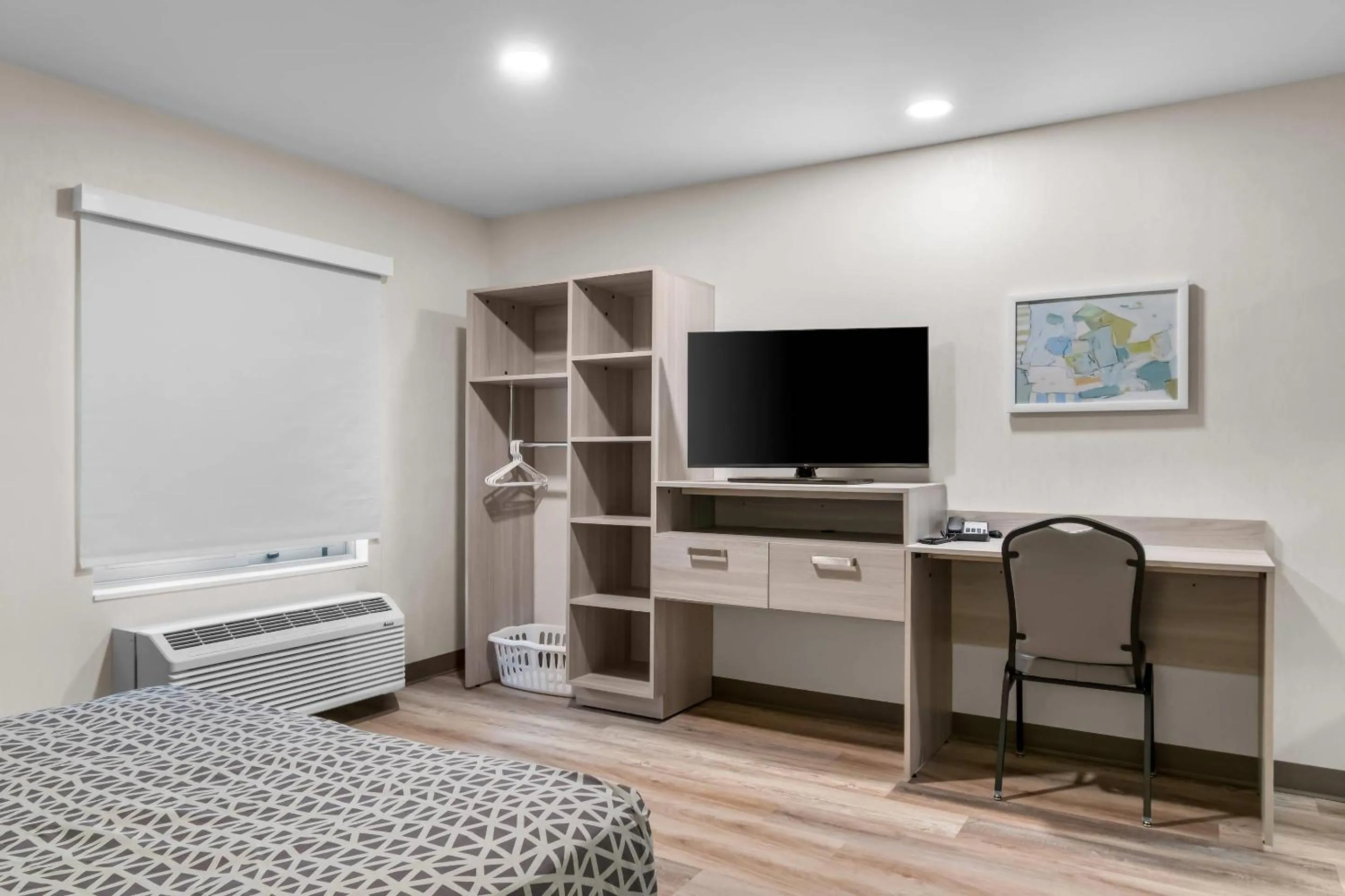 Bedroom, Bed in WoodSpring Suites Harrisburg Carlisle