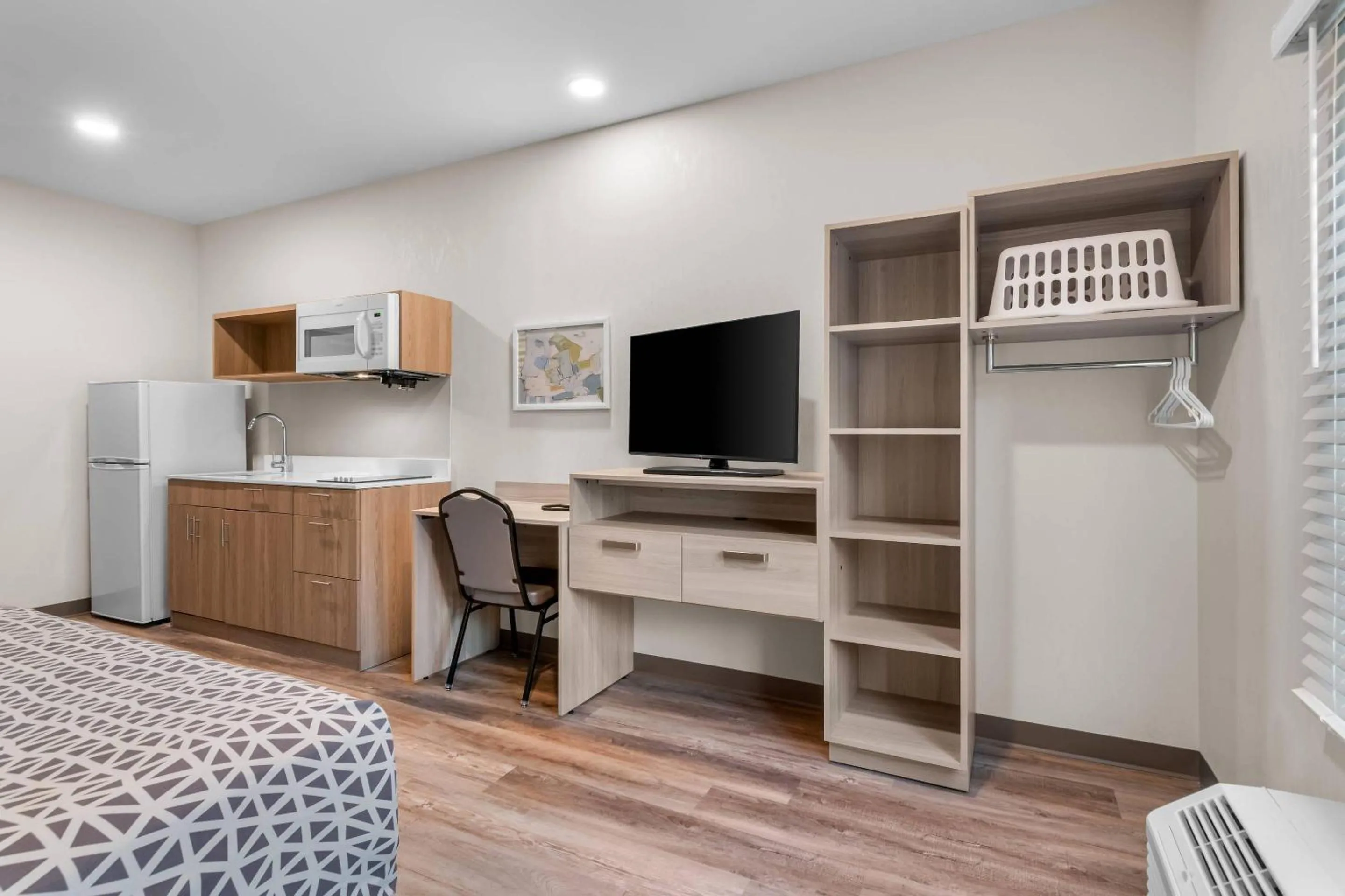 Bedroom, Bed in WoodSpring Suites Harrisburg Carlisle