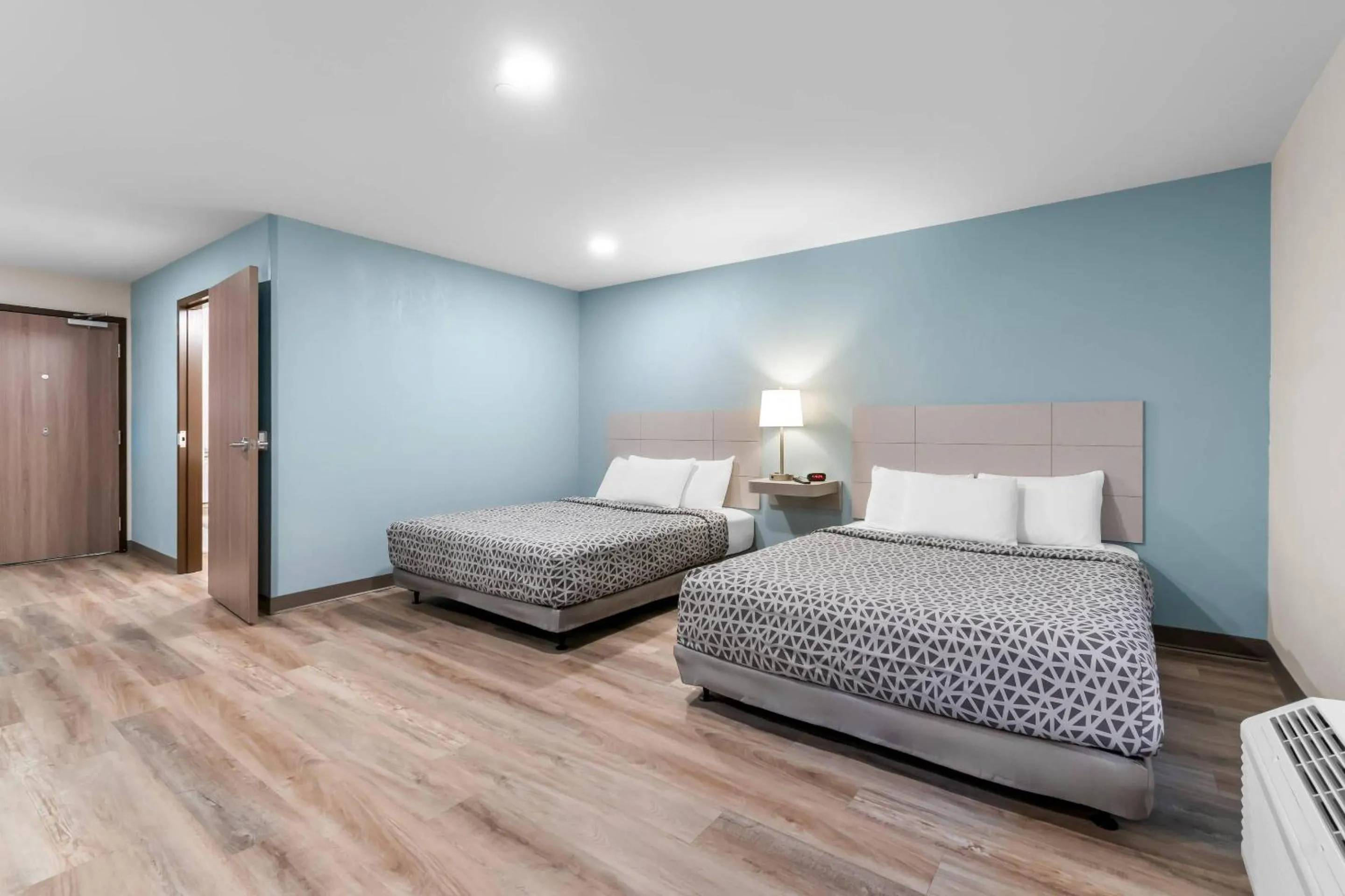 Bedroom, Bed in WoodSpring Suites Harrisburg Carlisle