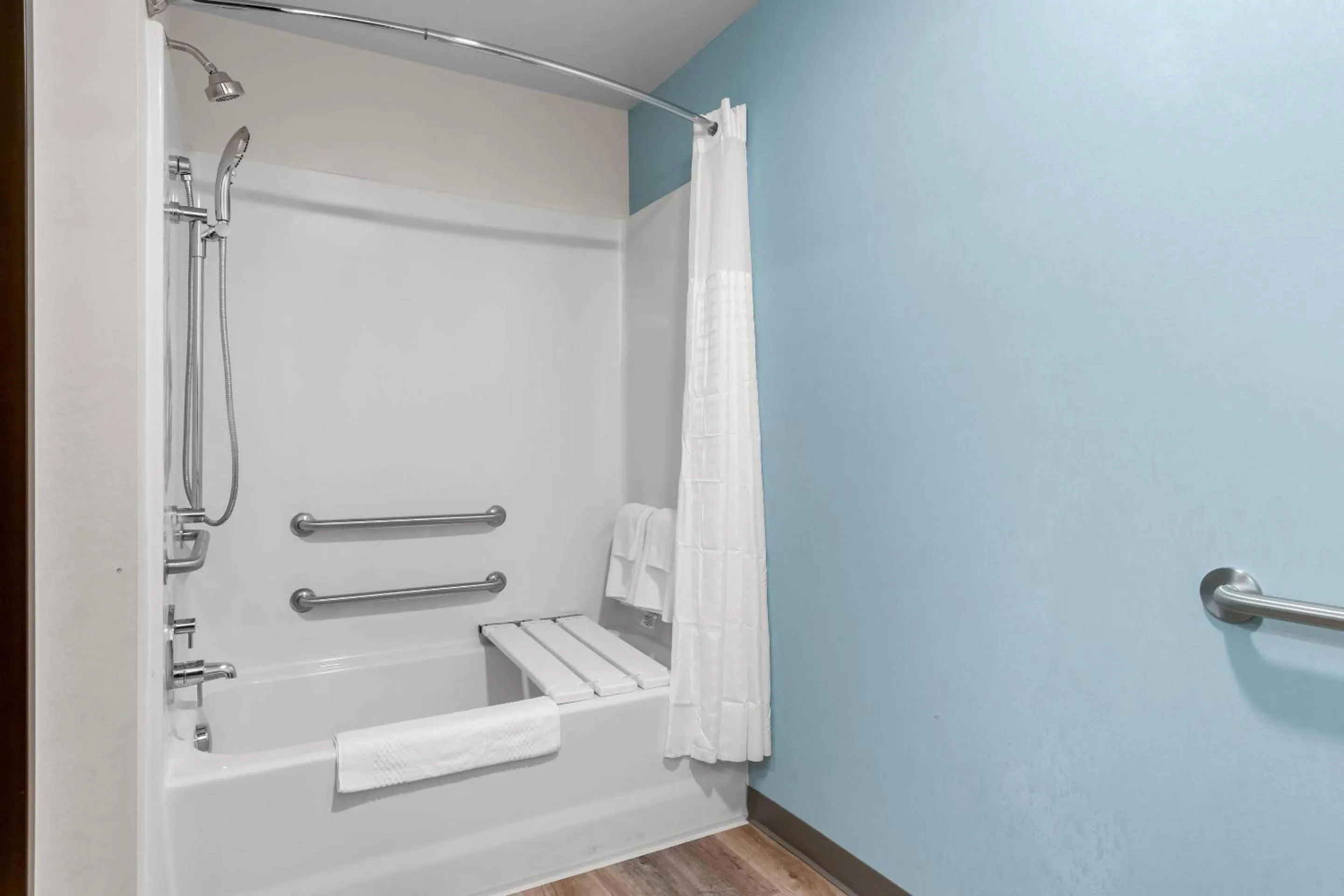 Bedroom in WoodSpring Suites Harrisburg Carlisle