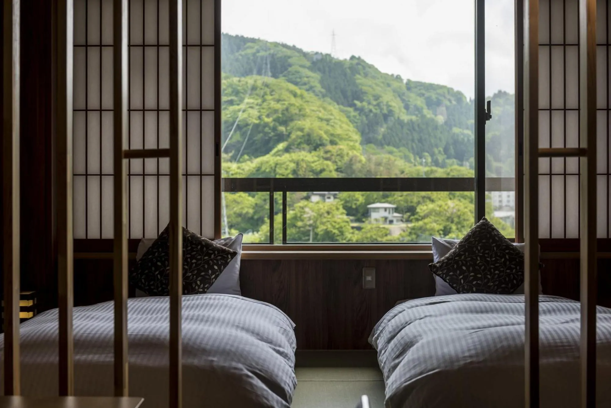 Photo of the whole room, Bed in Takamiya Bettei Kuon