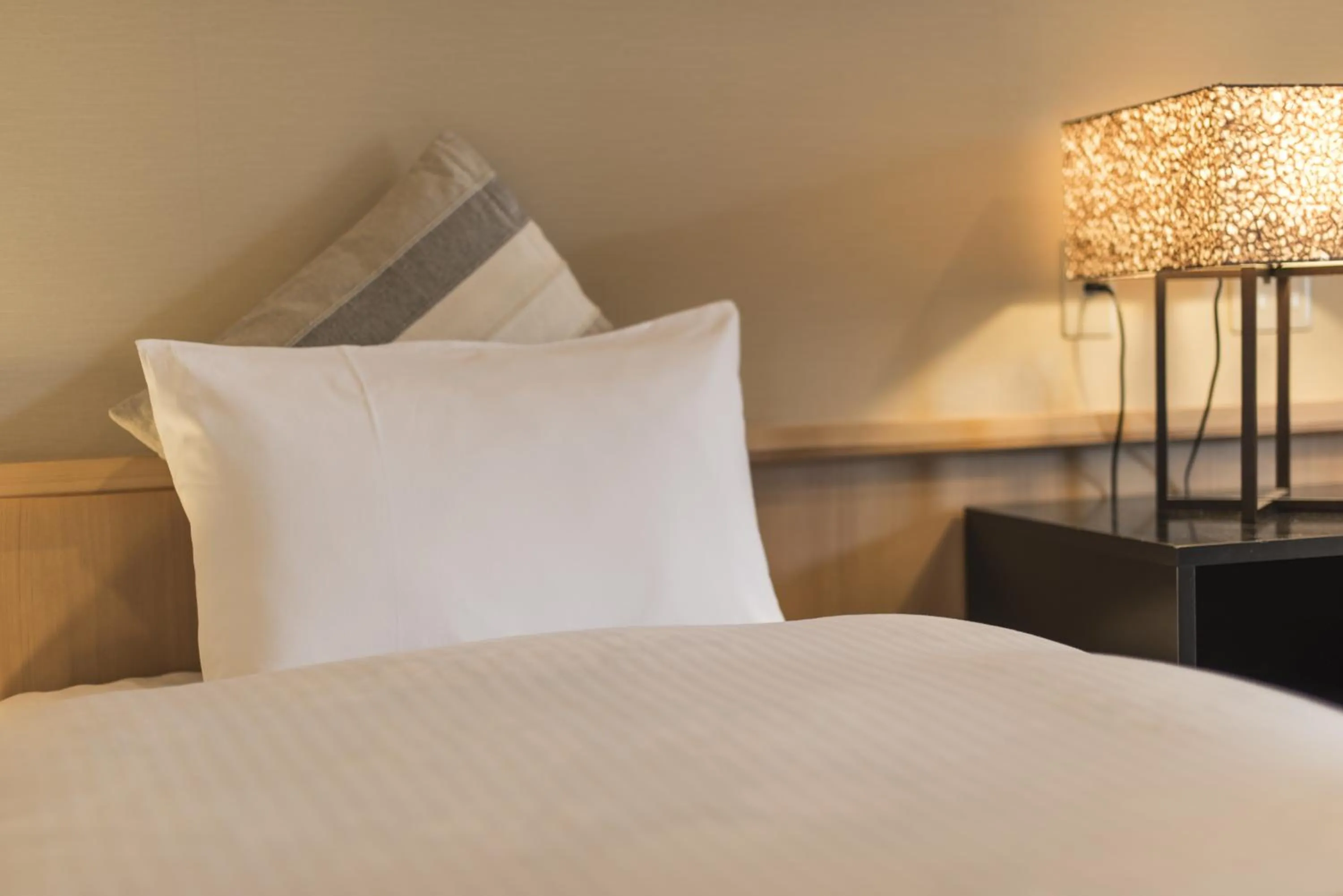 Bed in Takamiya Bettei Kuon