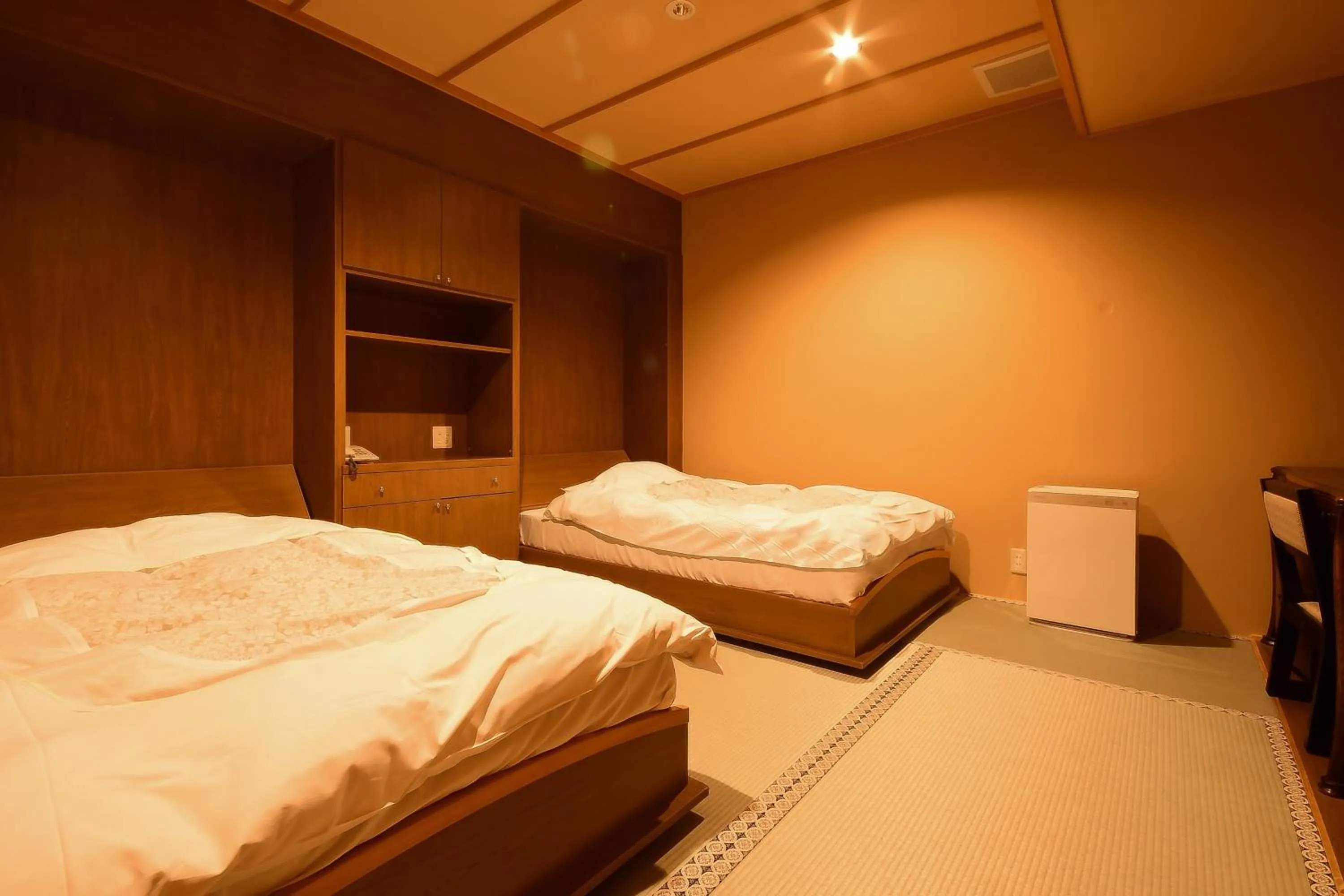 Bed in 高野山 宿坊 総持院 -Koyasan Shukubo Sojiin-