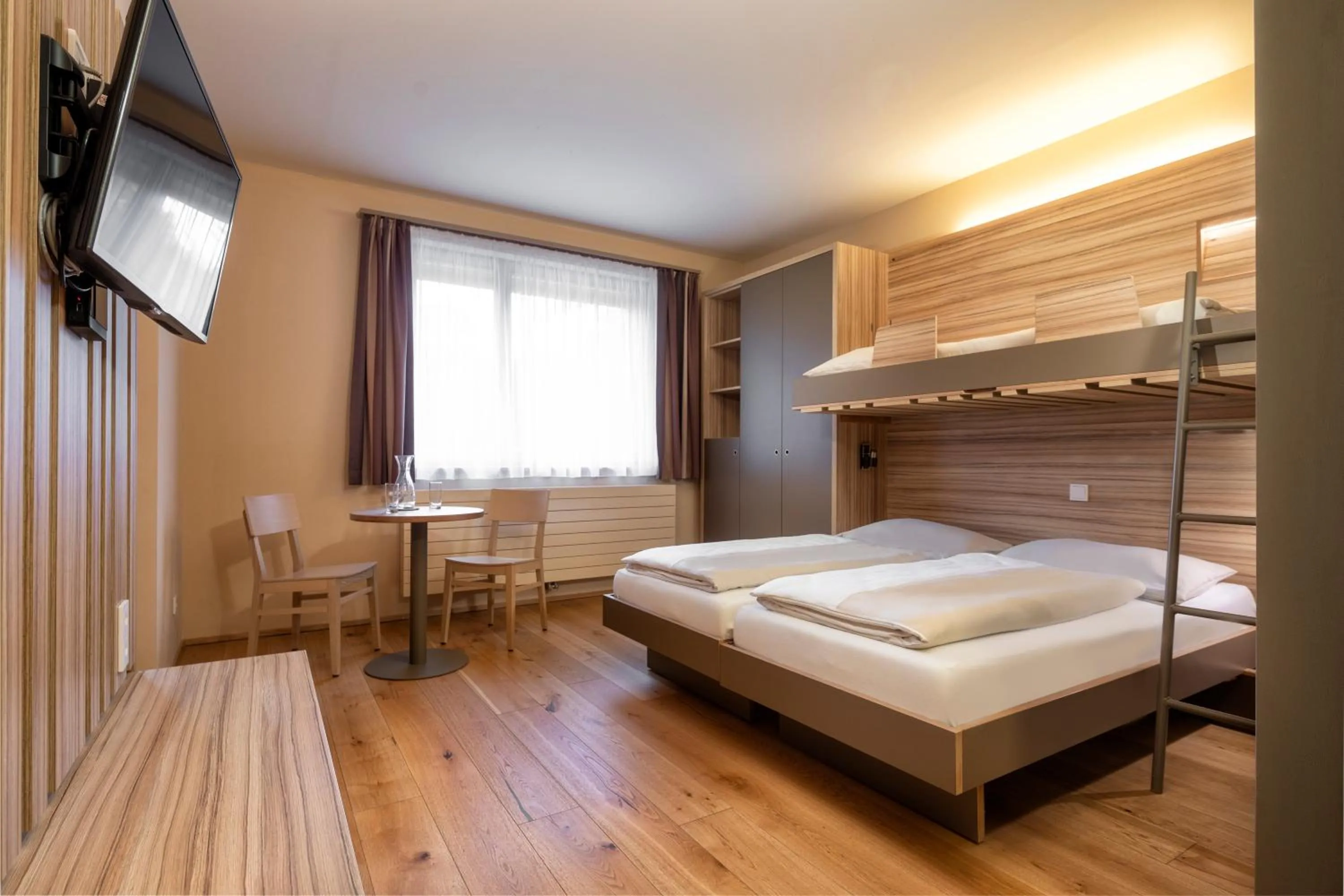 TV and multimedia, Bed in JUFA Hotel Malbun