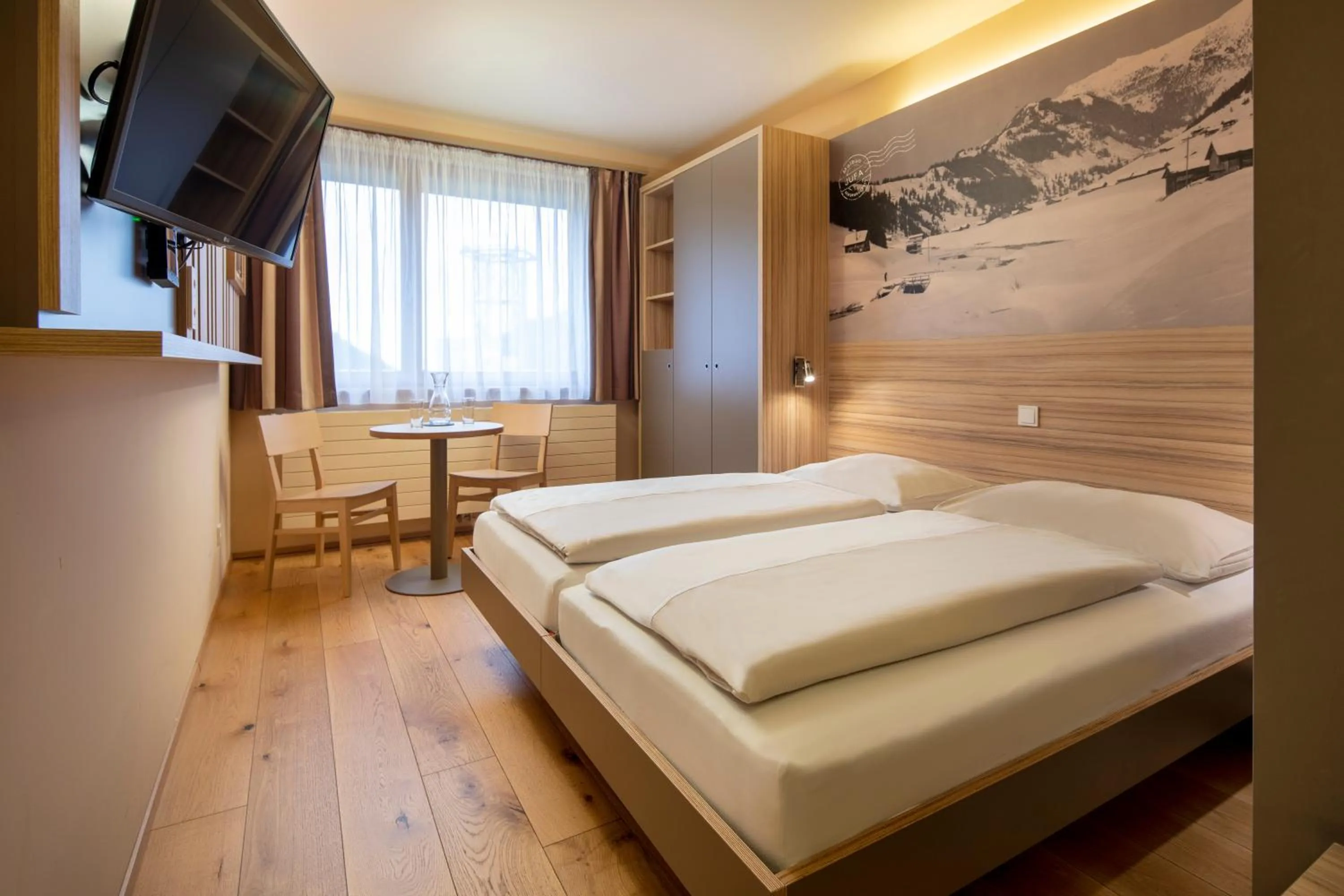 TV and multimedia, Bed in JUFA Hotel Malbun