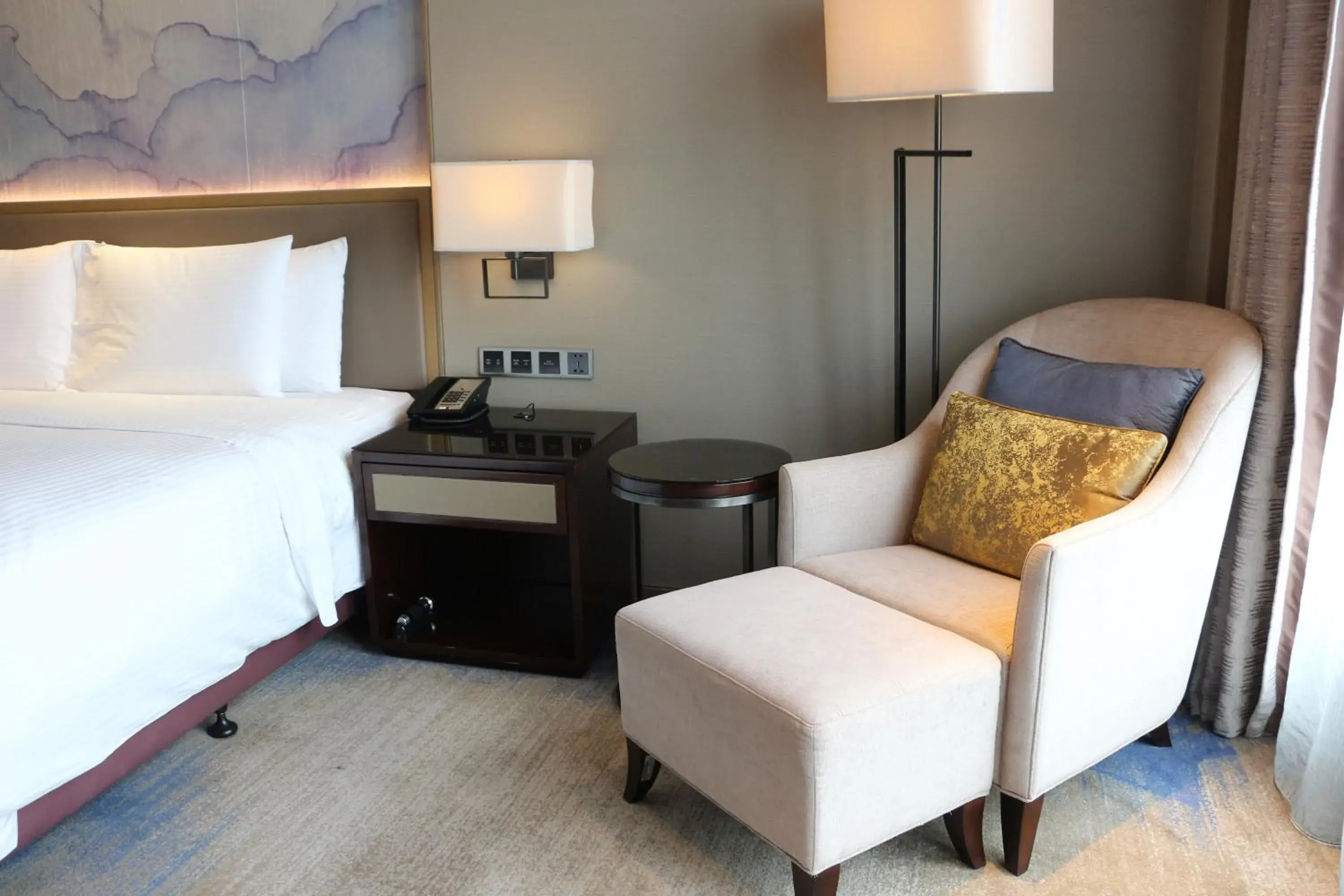 Seating area, Bed in Wanda Realm Huangshi Seating area, Bed in Wanda Realm Huangshi