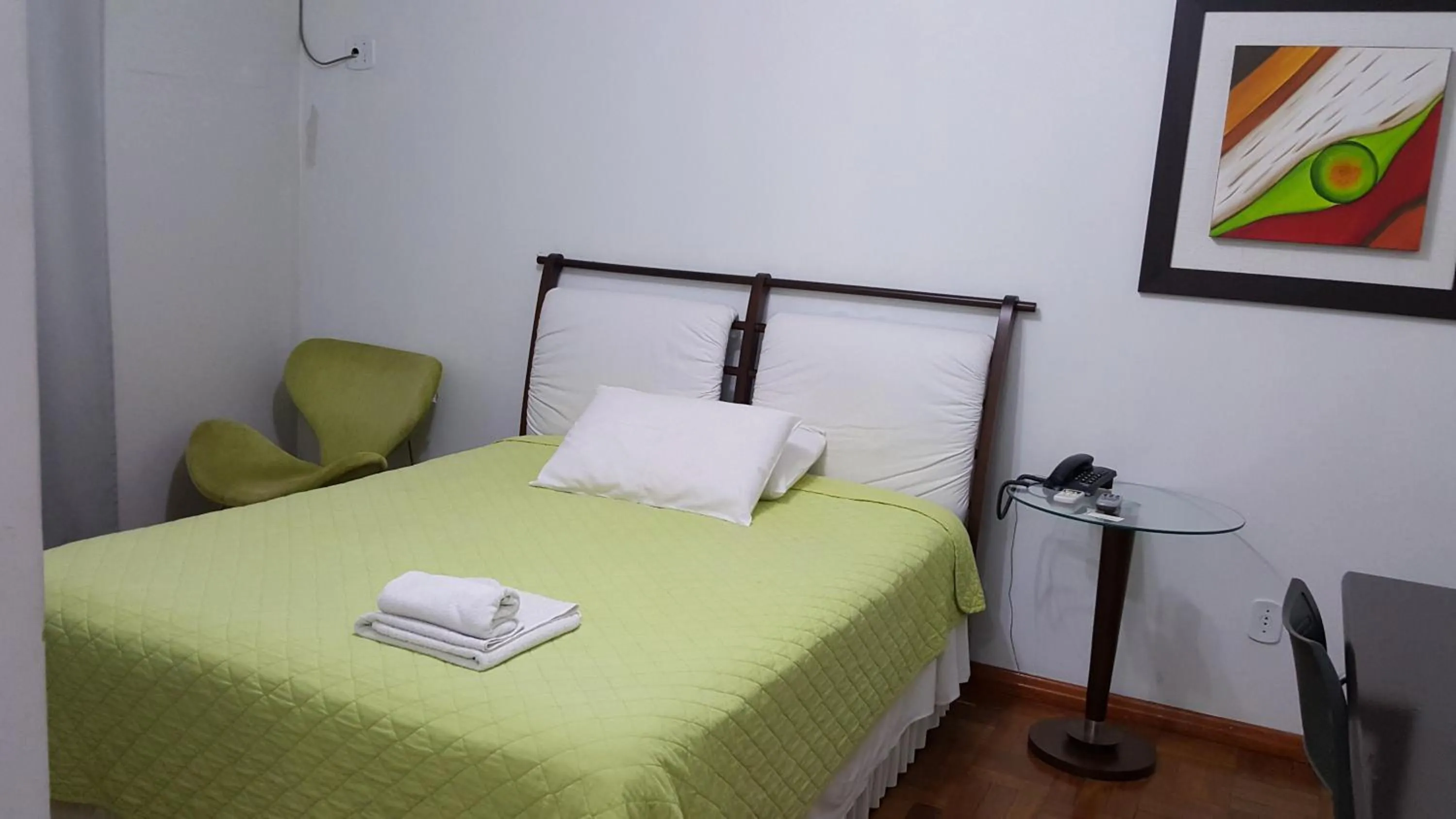 Bed in Cristal Executive Hotel