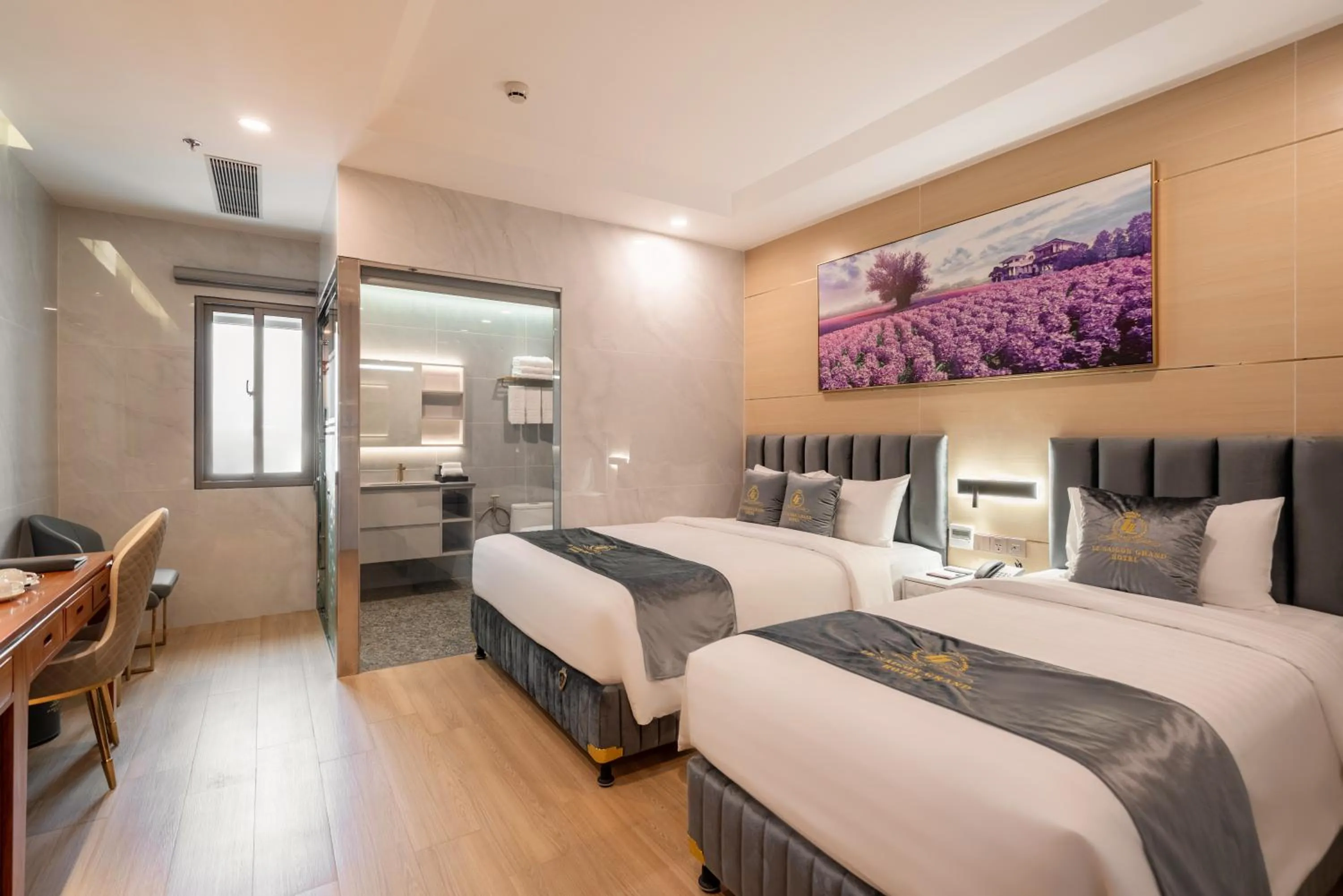 Bed in Le Saigon Grand Hotel