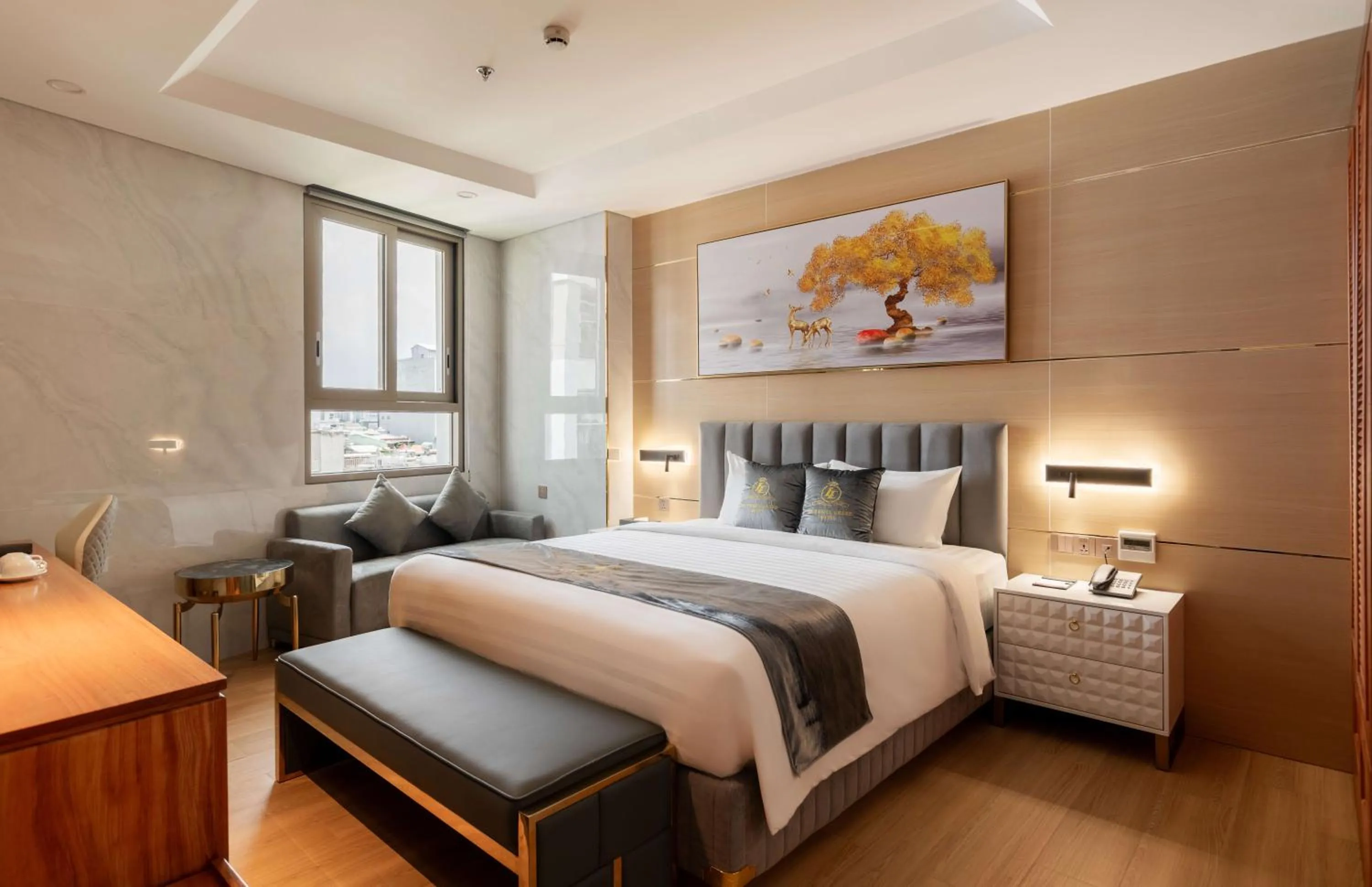 Bed in Le Saigon Grand Hotel