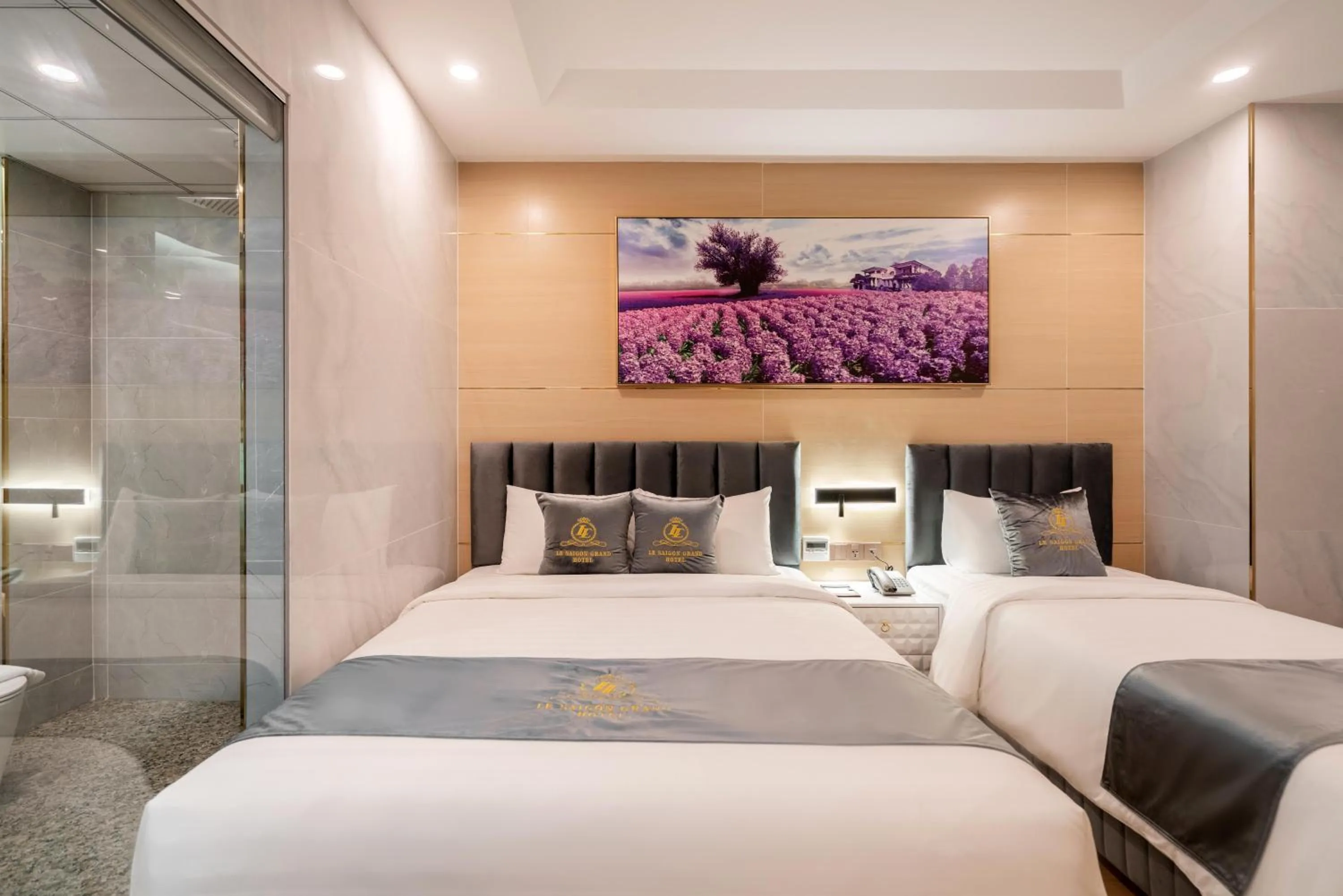 Bed in Le Saigon Grand Hotel