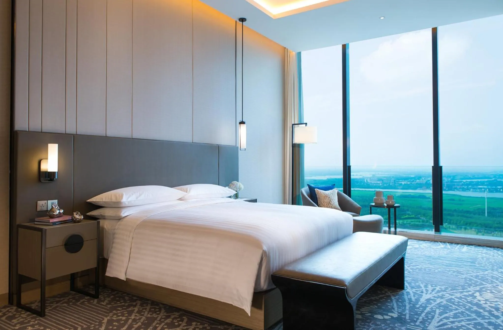 Bed in Renaissance Suzhou Wujiang Hotel