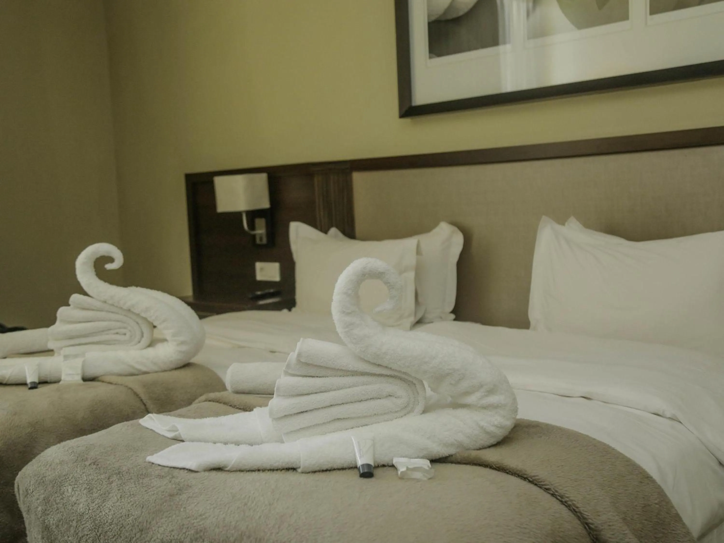 Bedroom, Bed in Pullman Lubumbashi Grand Karavia.