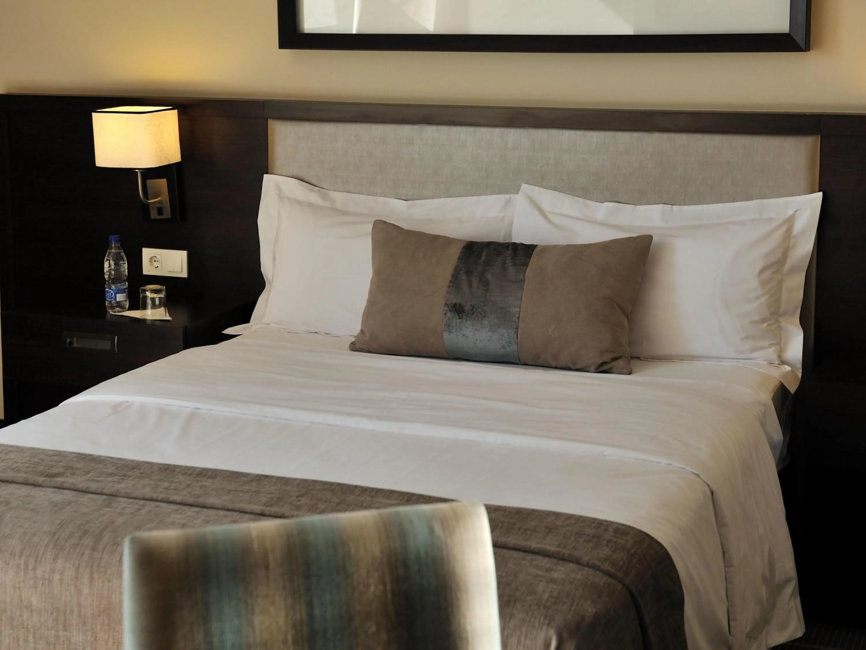 Bedroom, Bed in Pullman Lubumbashi Grand Karavia.