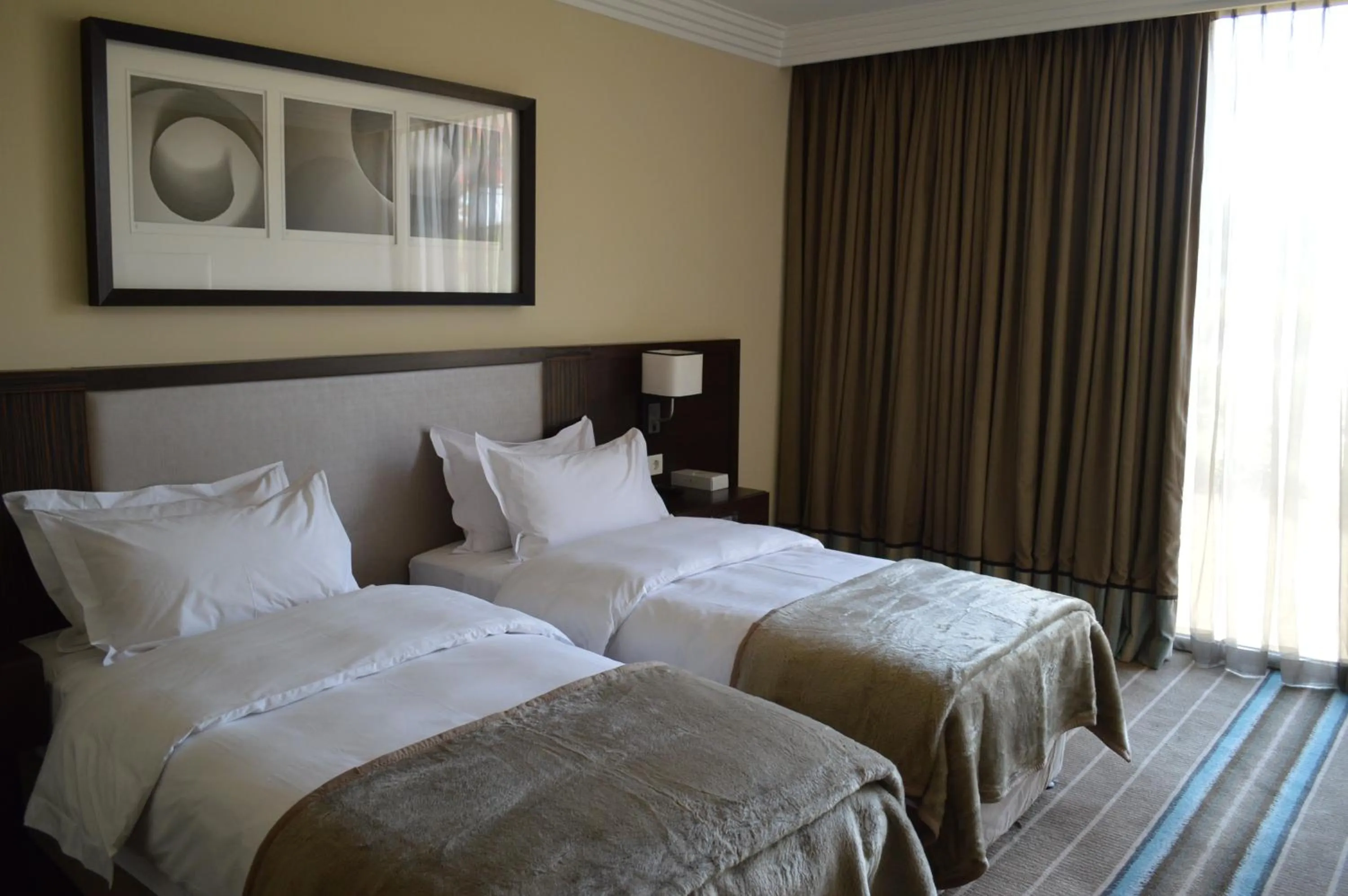 Bed in Pullman Lubumbashi Grand Karavia.