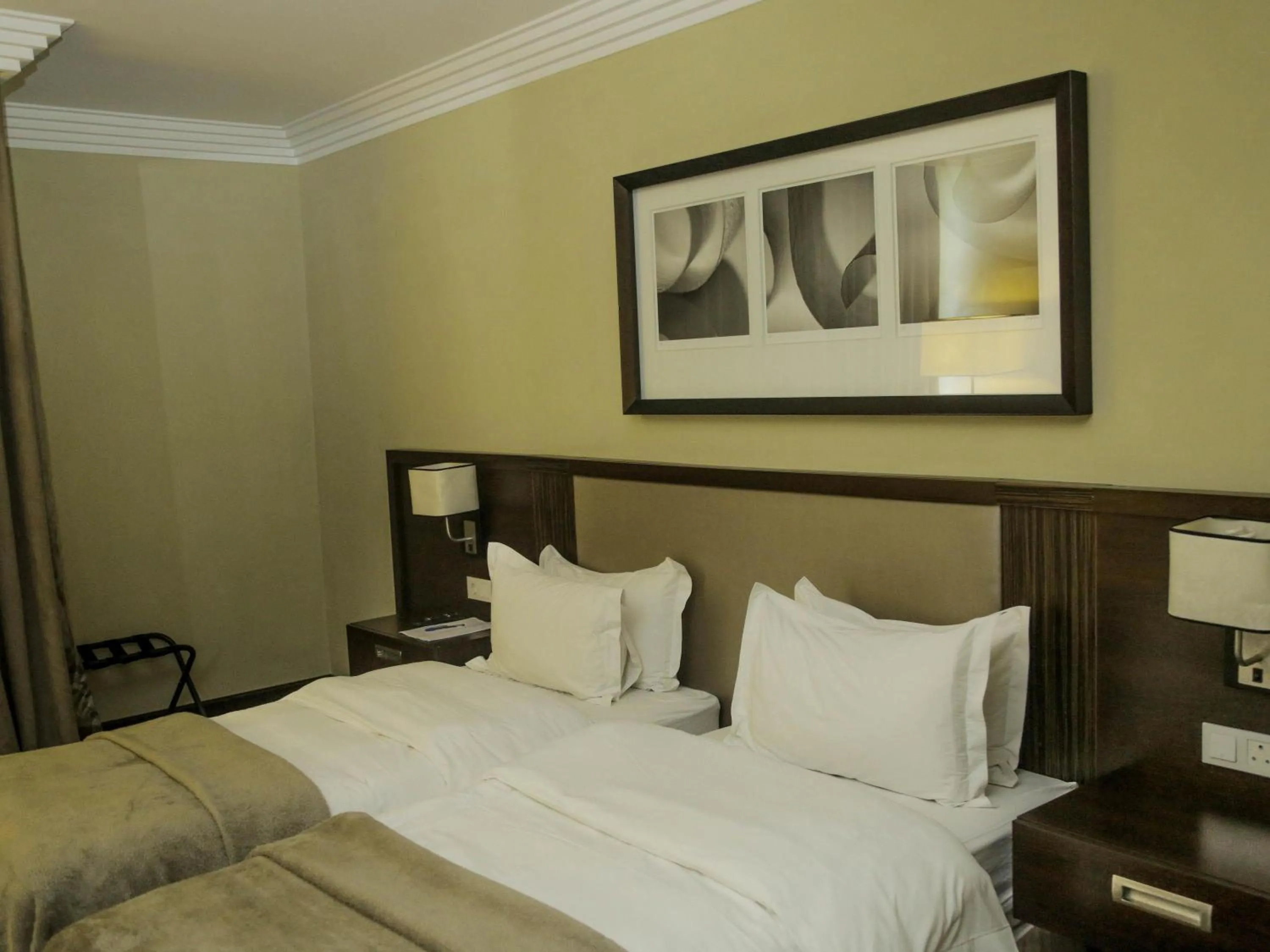 Bedroom, Bed in Pullman Lubumbashi Grand Karavia.