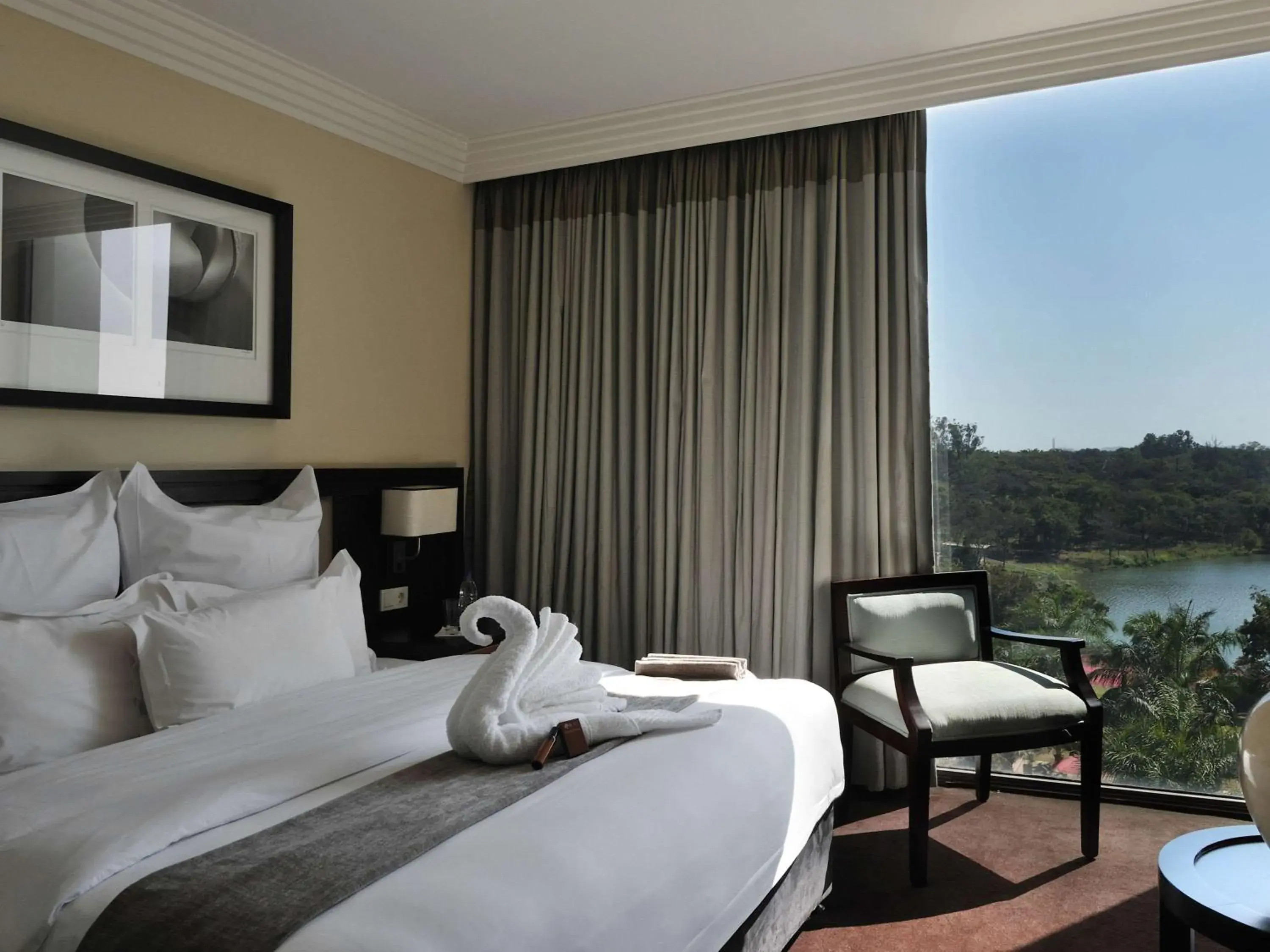 Photo of the whole room, Bed in Pullman Lubumbashi Grand Karavia. Photo of the whole room, Bed in Pullman Lubumbashi Grand Karavia.