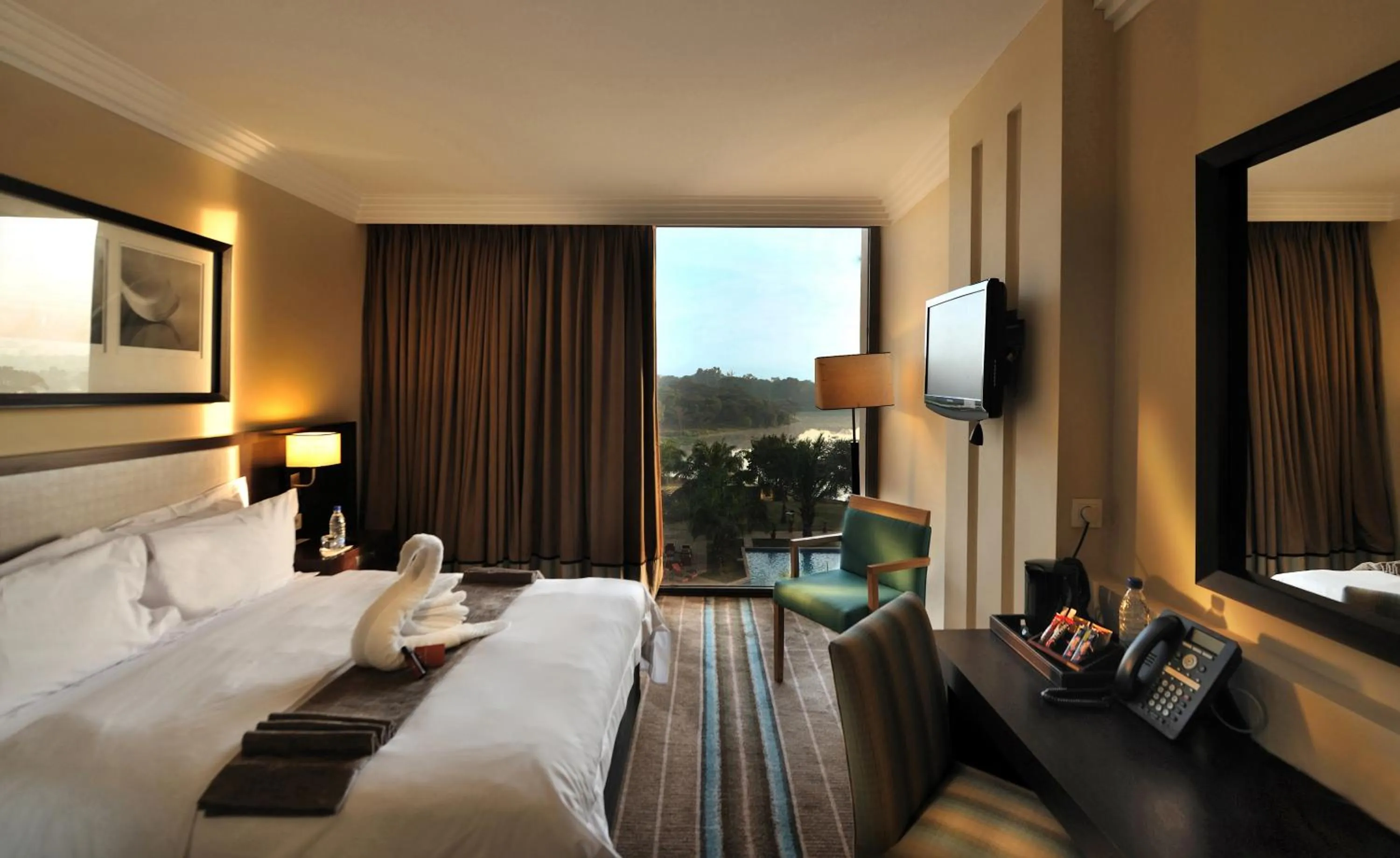 Bedroom, Bed in Pullman Lubumbashi Grand Karavia.