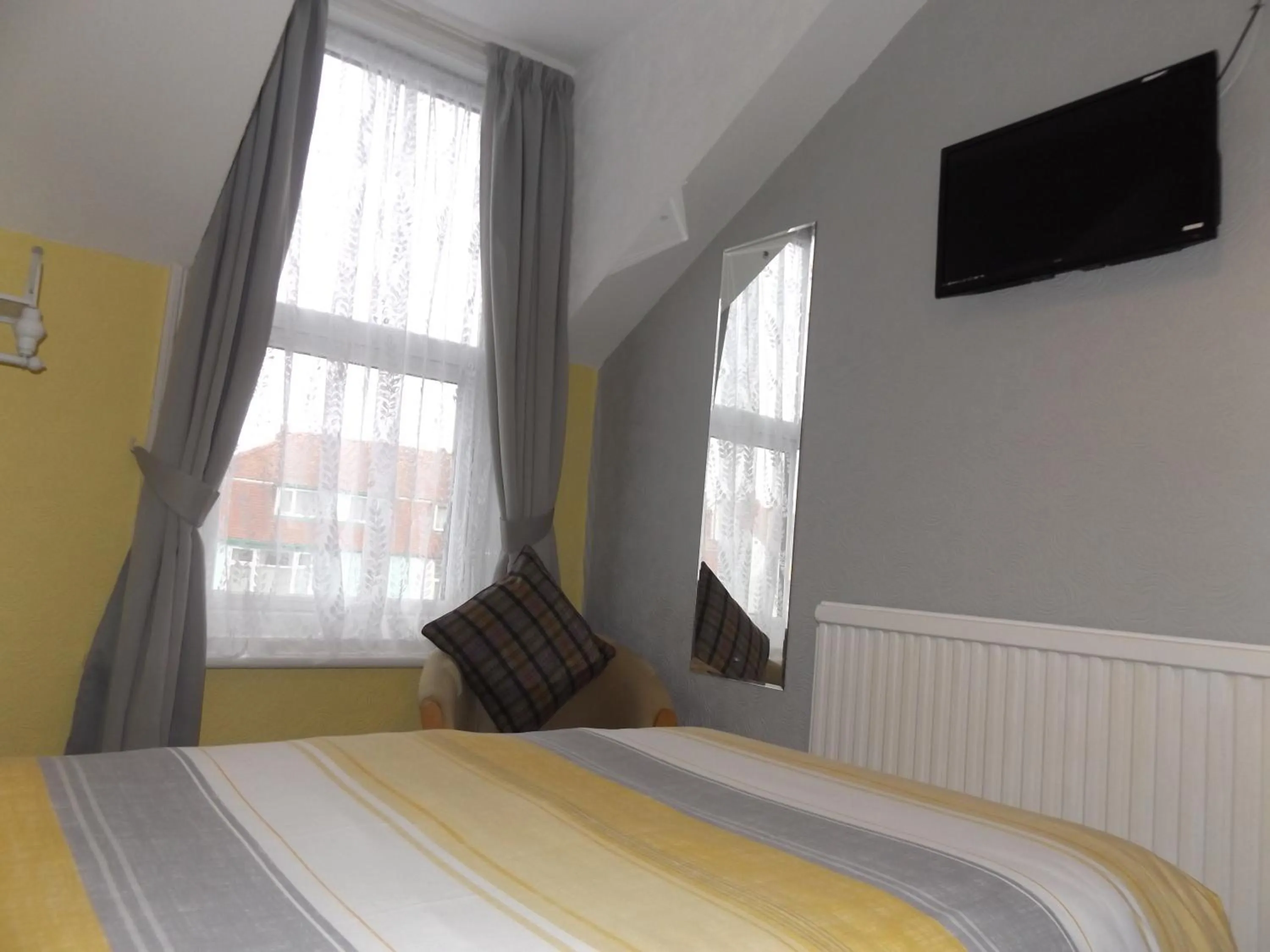 Bedroom in The Phoenix Guest House