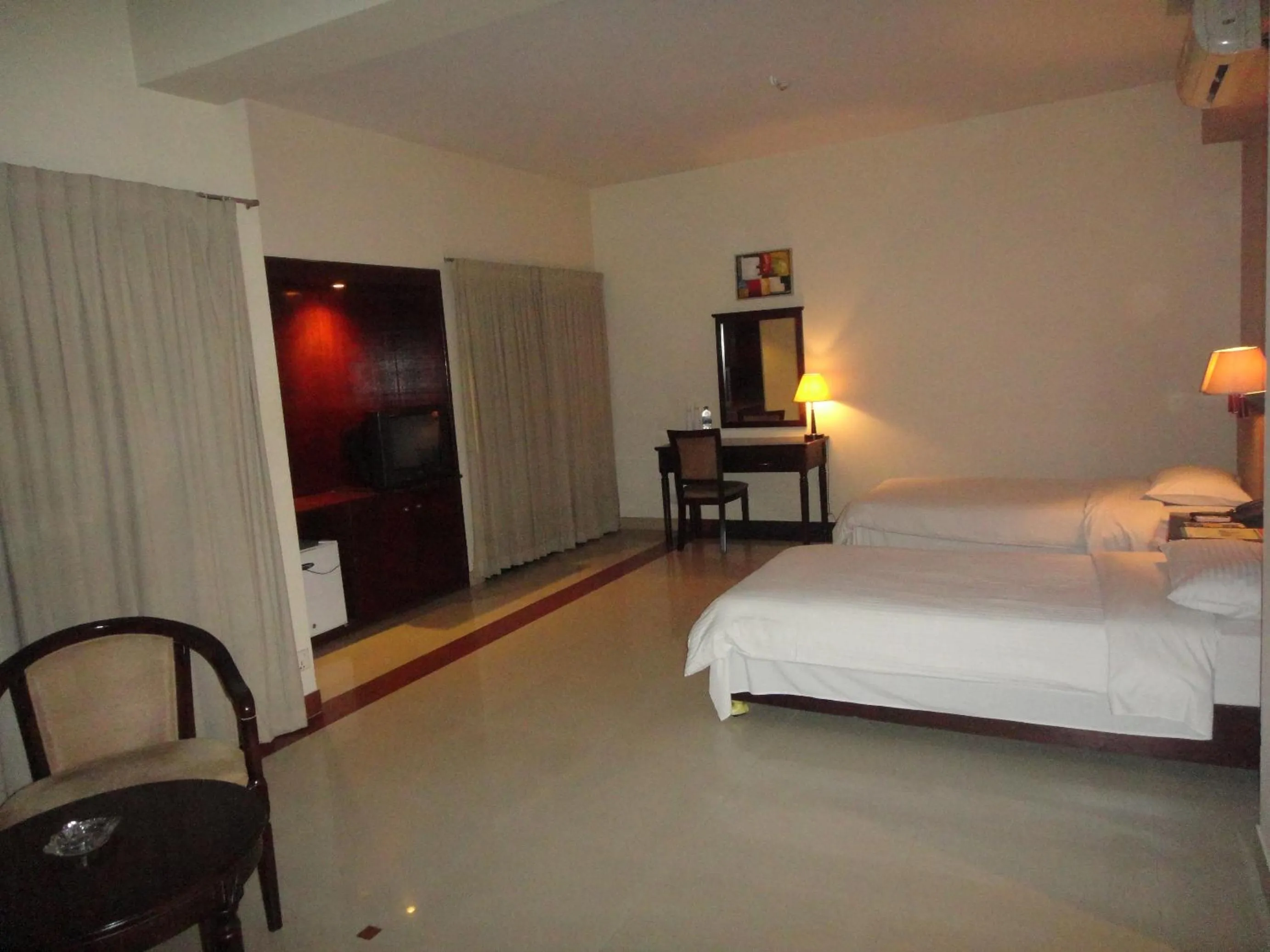 Seating area, Bed in Nirvana Inn