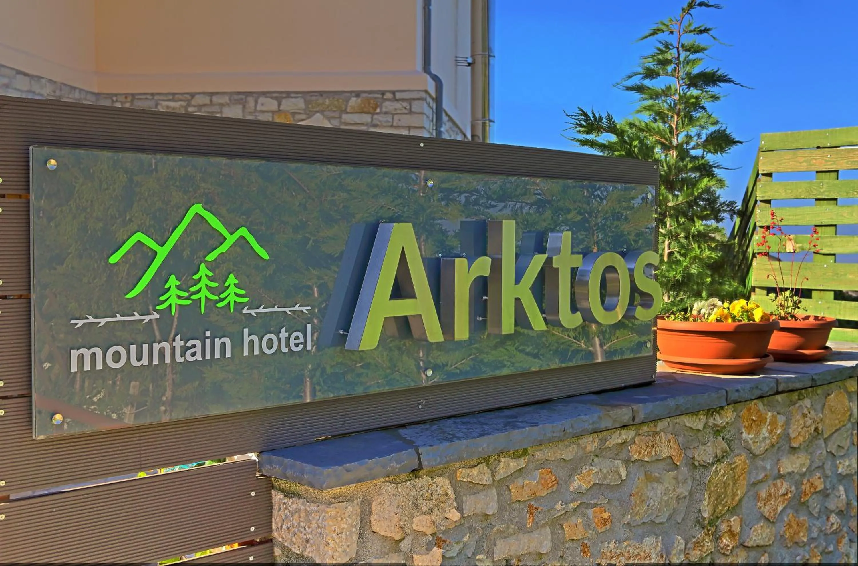 Property logo or sign in Arktos Hotel