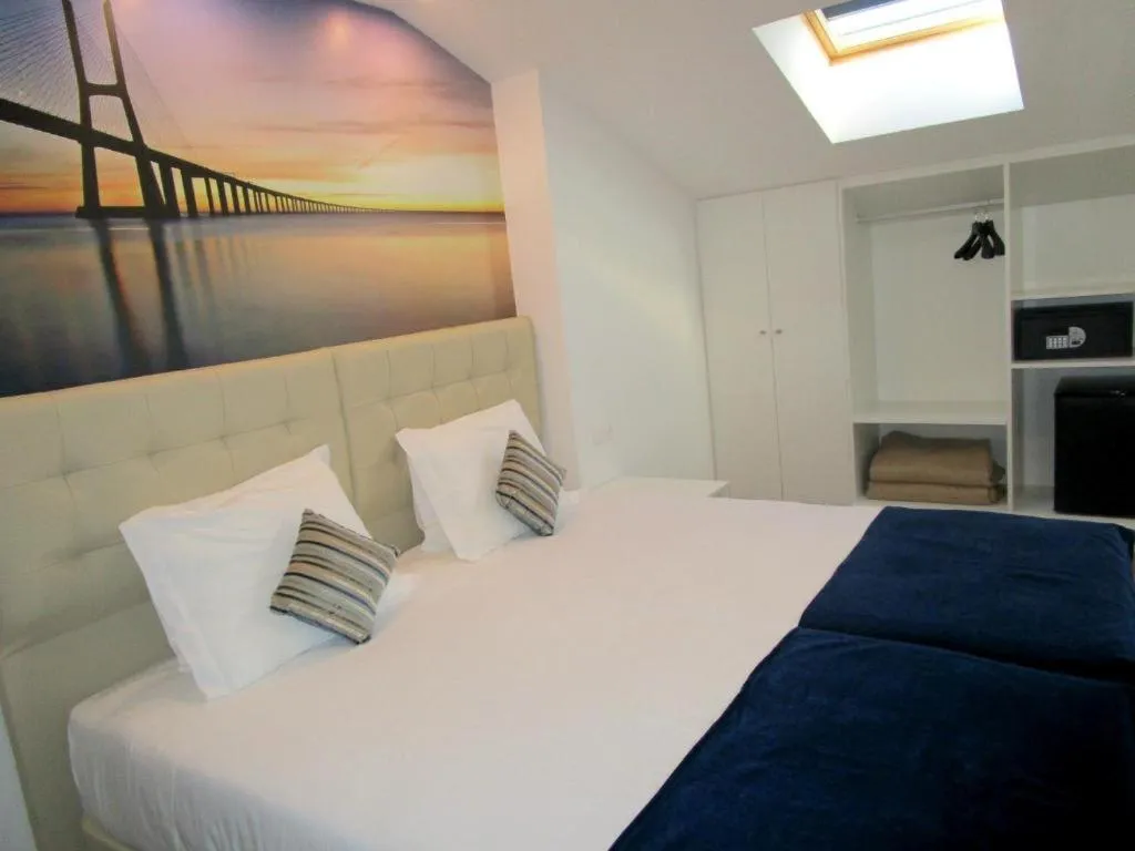 Bed in Lisbon City Apartments & Suites by City Hotels
