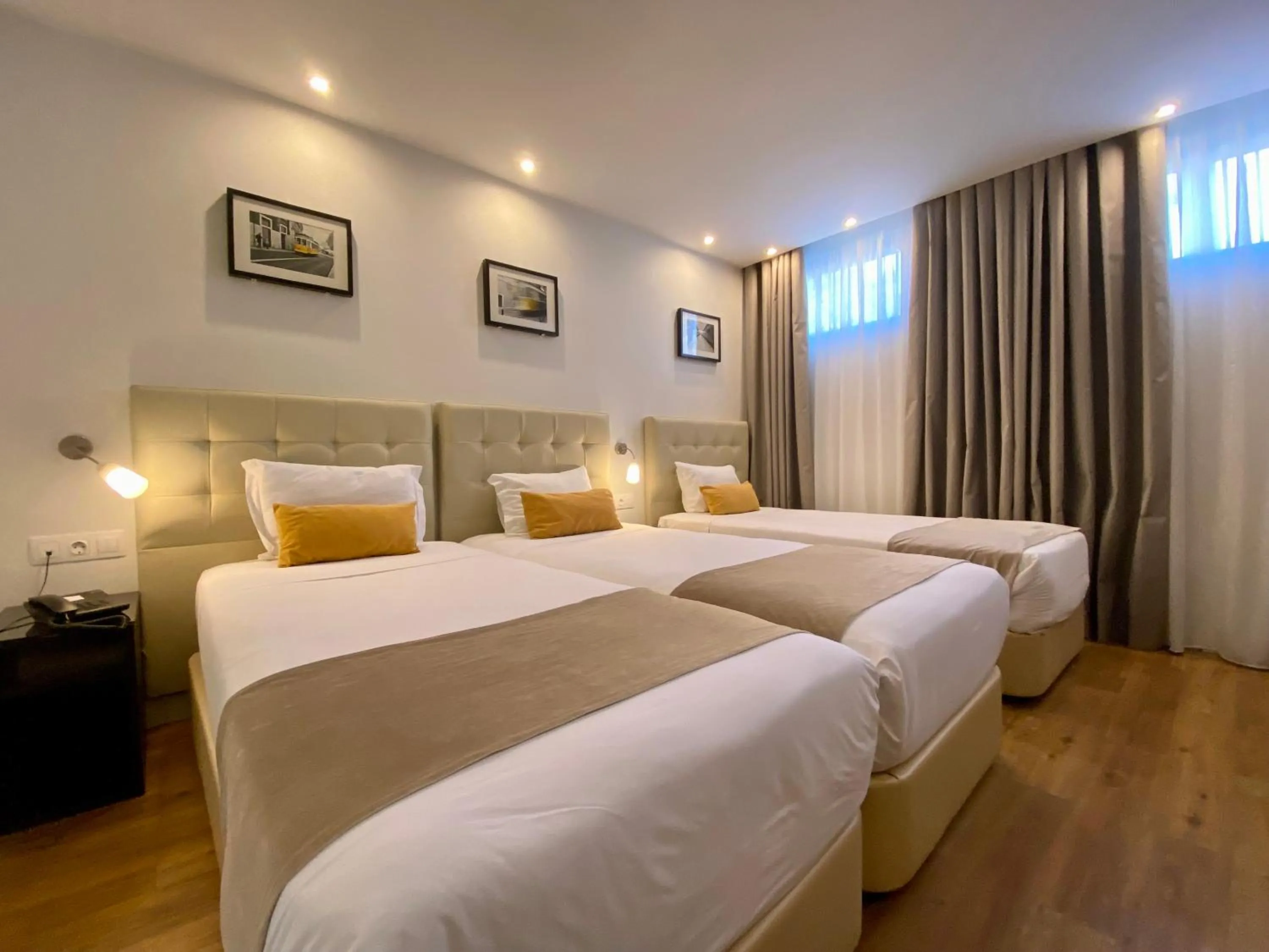 Bed in Lisbon City Apartments & Suites by City Hotels