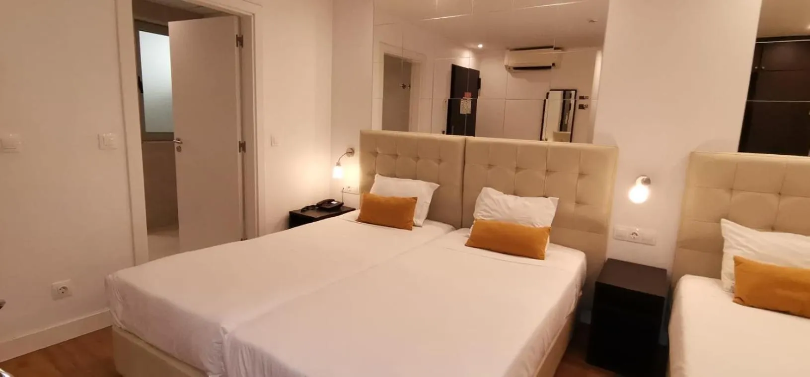 Bed in Lisbon City Apartments & Suites by City Hotels