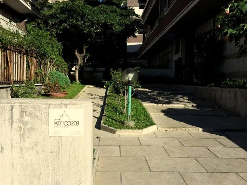 Property building in Attico 203