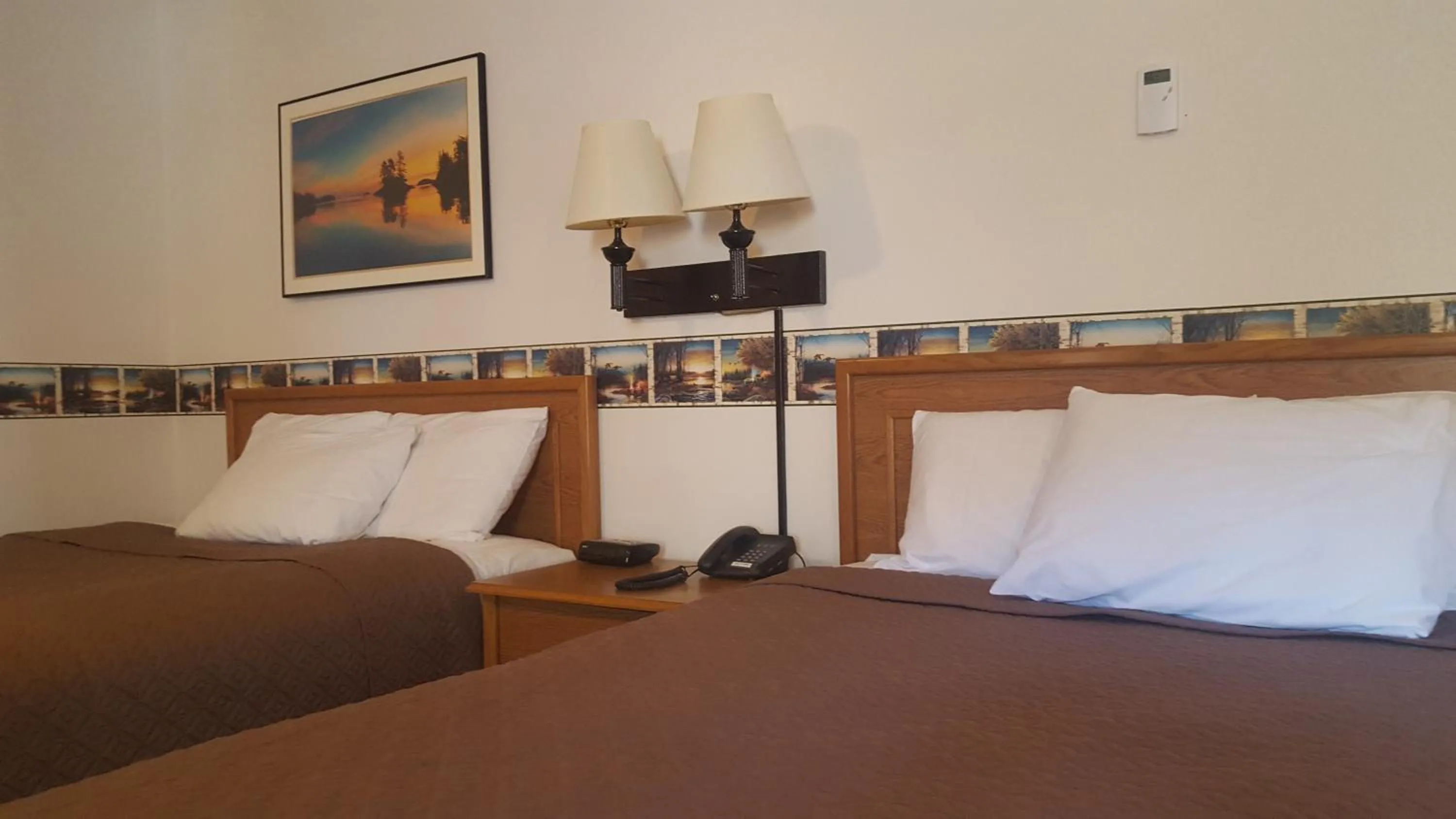 Bedroom in Longliner Lodge and Suites