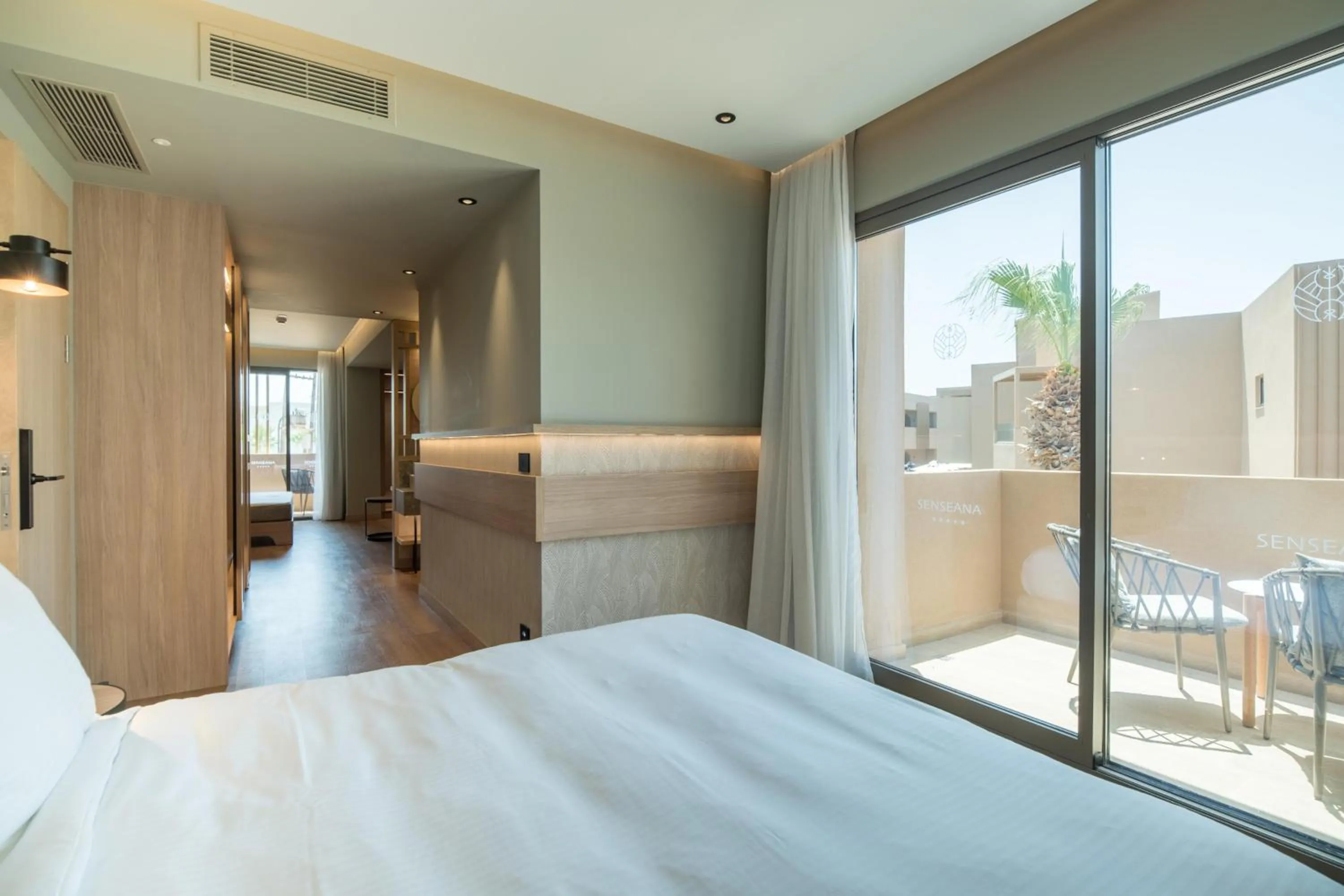 Photo of the whole room, Bed in SENSEANA Sea Side Resort & Aquadventure