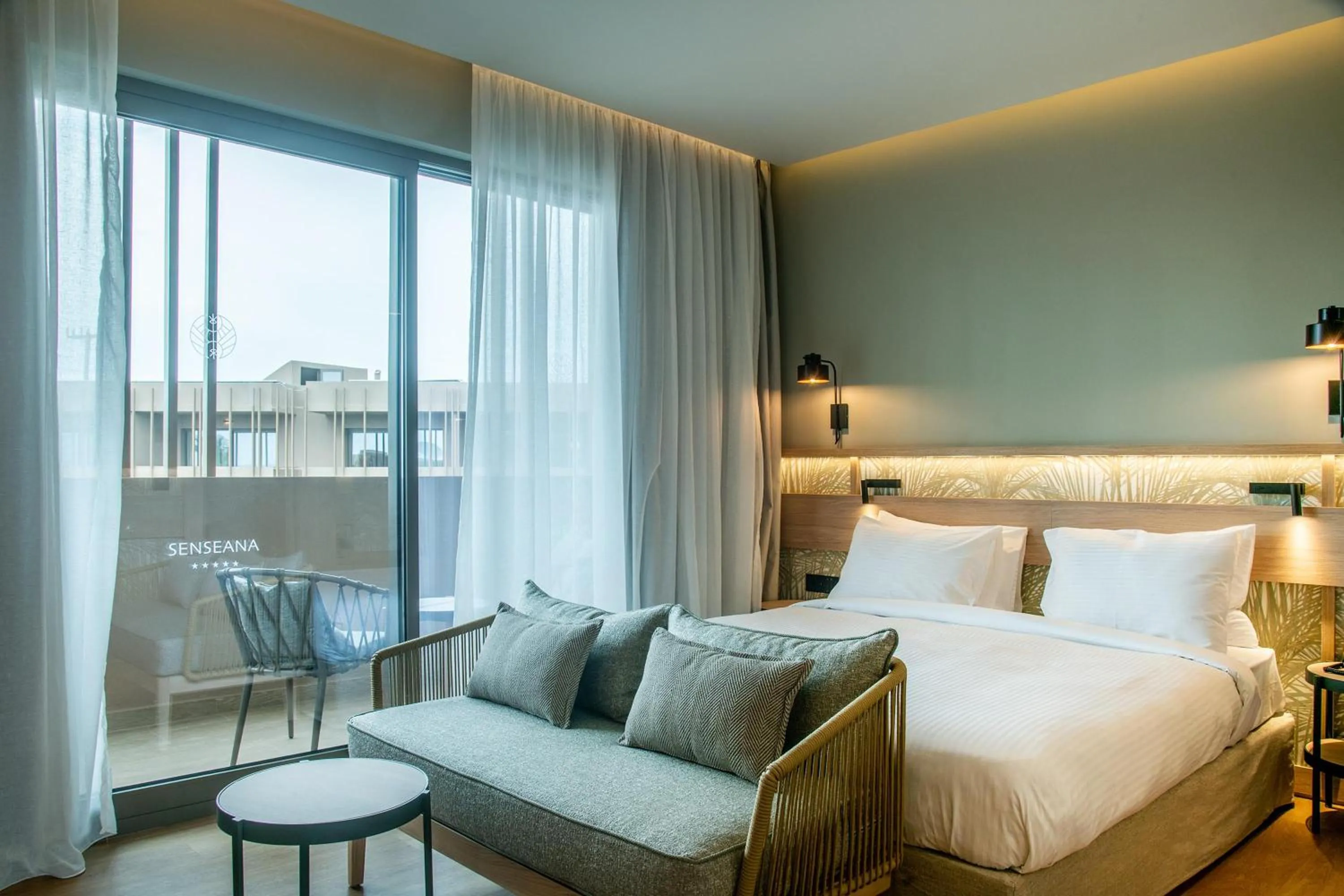 Photo of the whole room, Bed in SENSEANA Sea Side Resort & Aquadventure