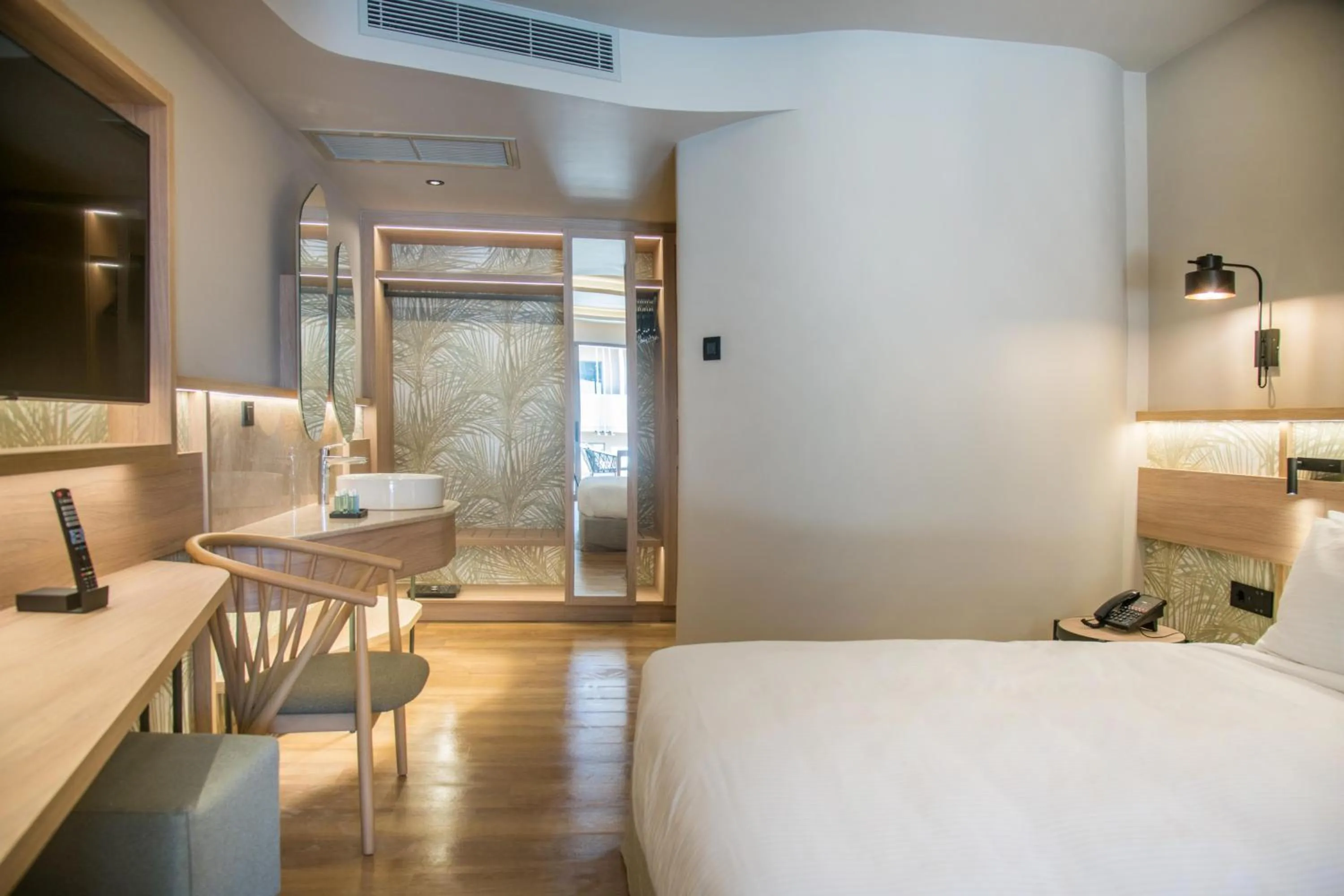 Photo of the whole room, Bed in SENSEANA Sea Side Resort & Aquadventure