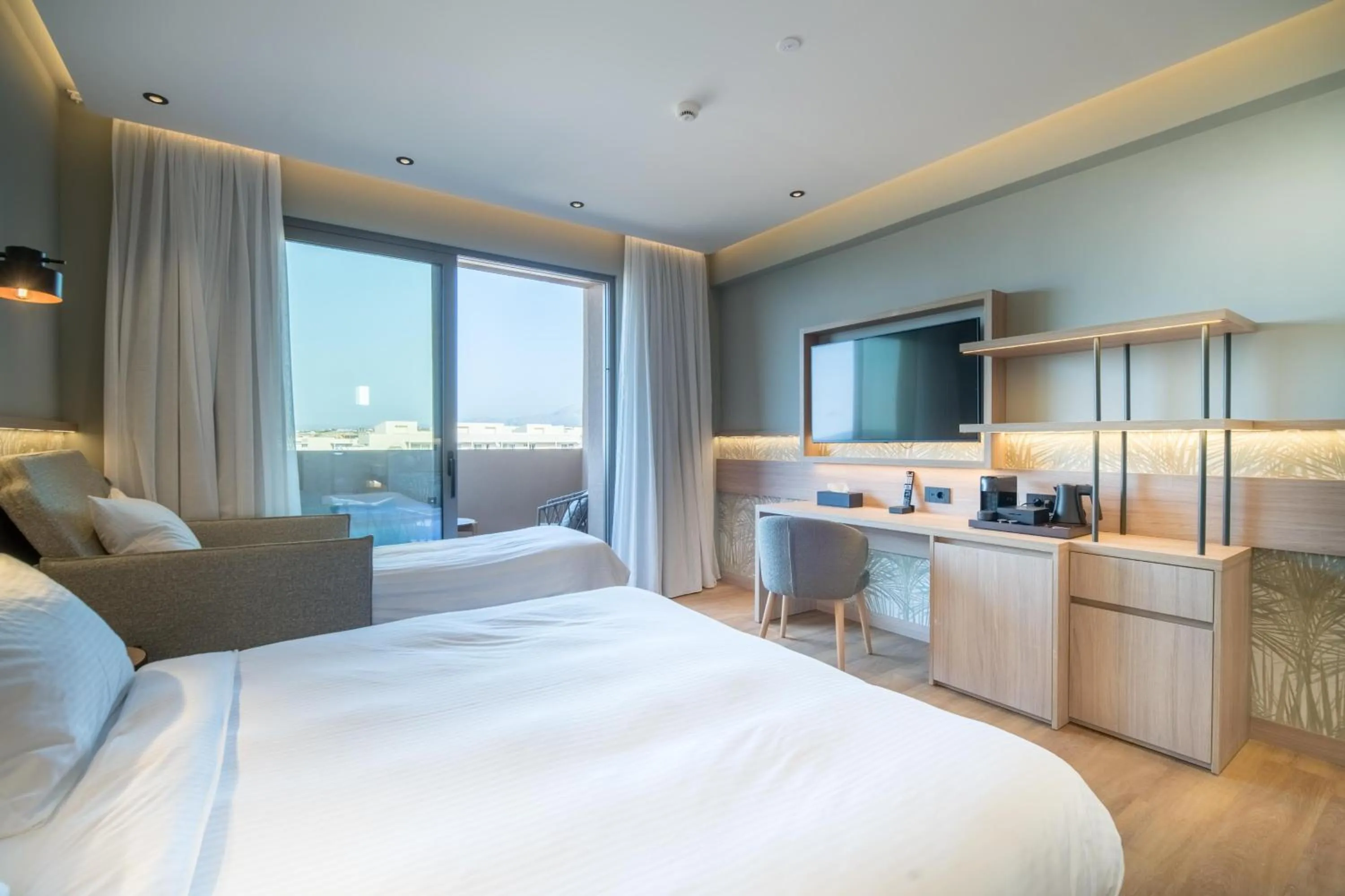 Photo of the whole room, Bed in SENSEANA Sea Side Resort & Aquadventure