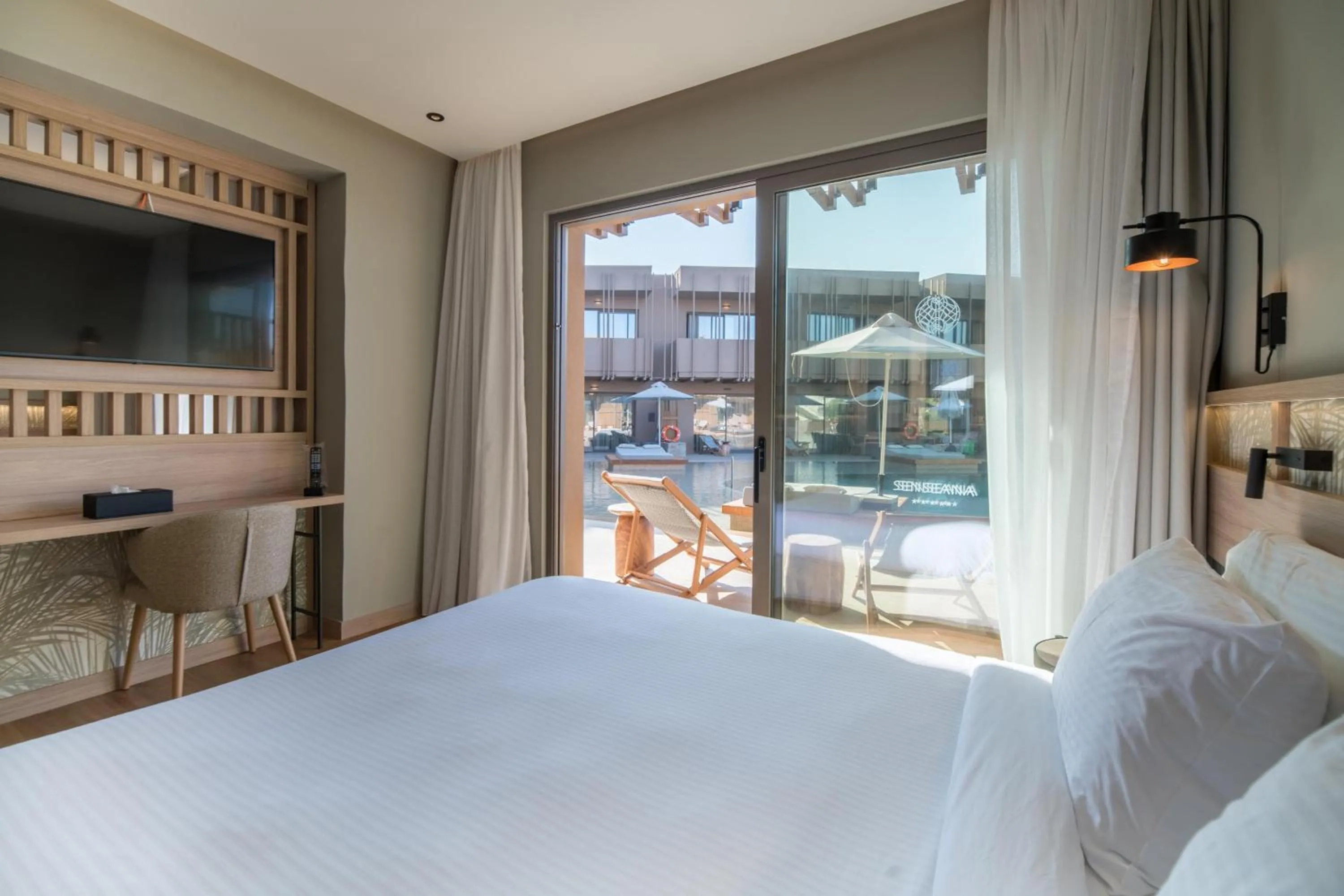 Photo of the whole room, Bed in SENSEANA Sea Side Resort & Aquadventure