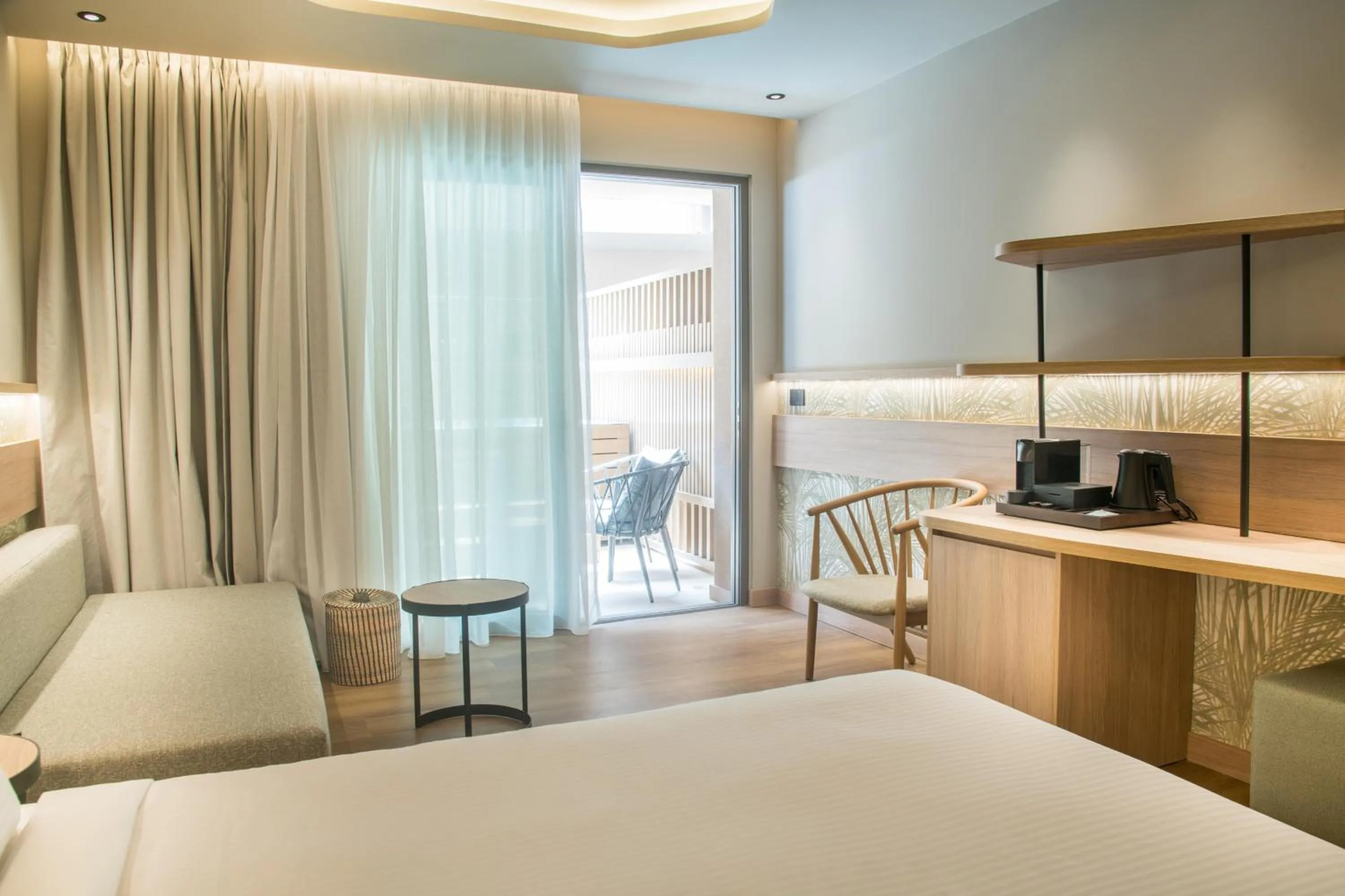 Photo of the whole room, Bed in SENSEANA Sea Side Resort & Aquadventure