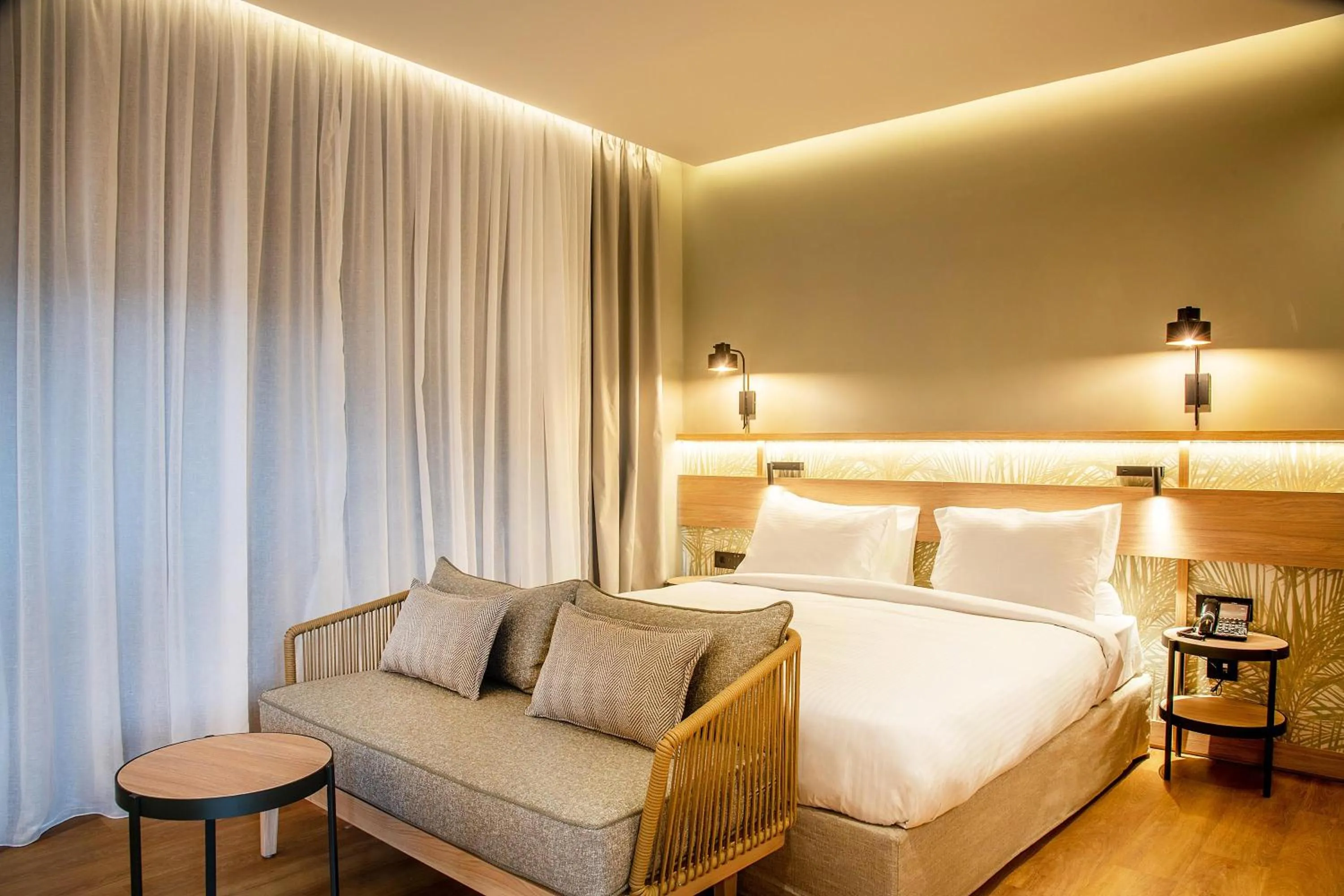 Photo of the whole room, Bed in SENSEANA Sea Side Resort & Aquadventure