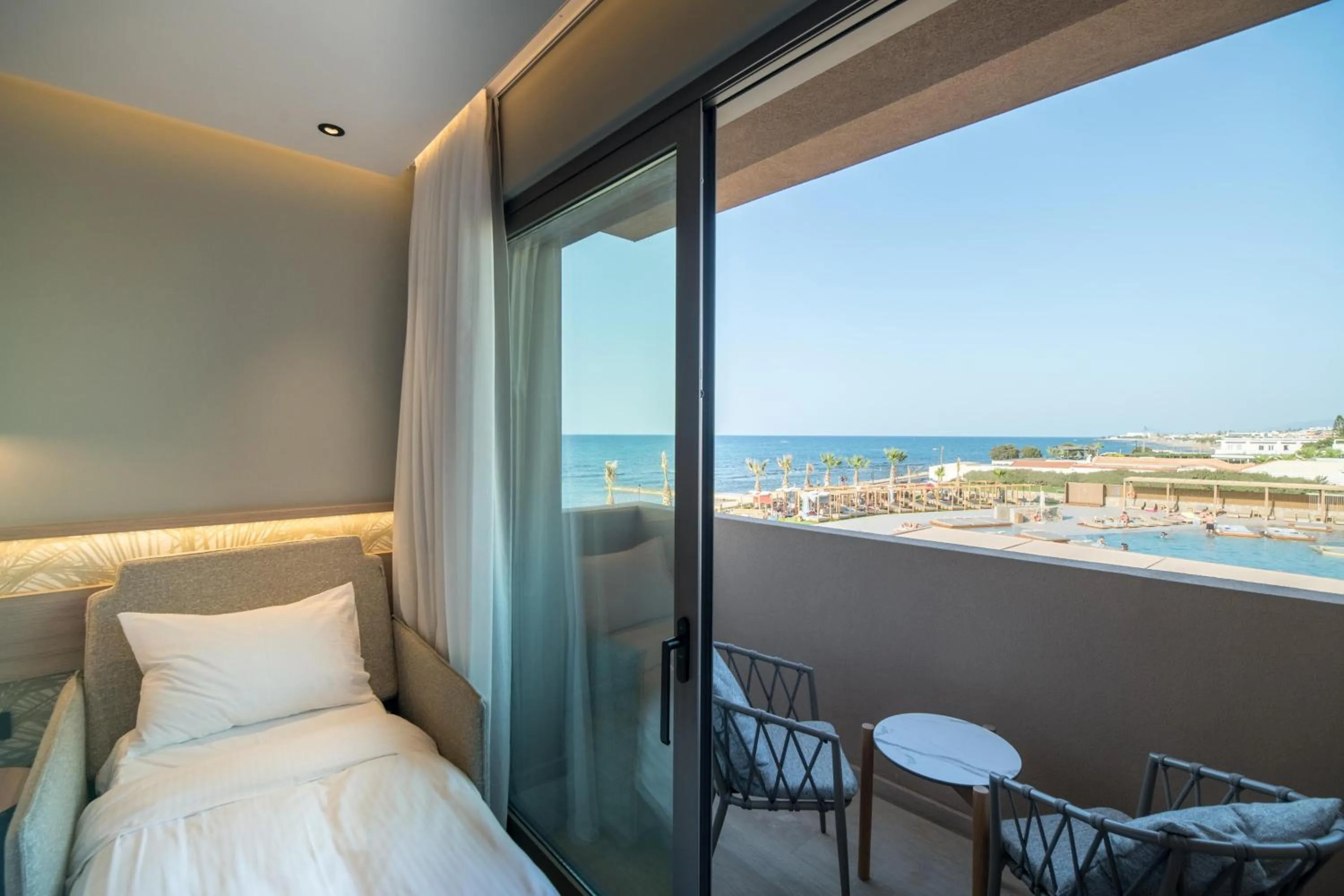 Photo of the whole room, Bed in SENSEANA Sea Side Resort & Aquadventure