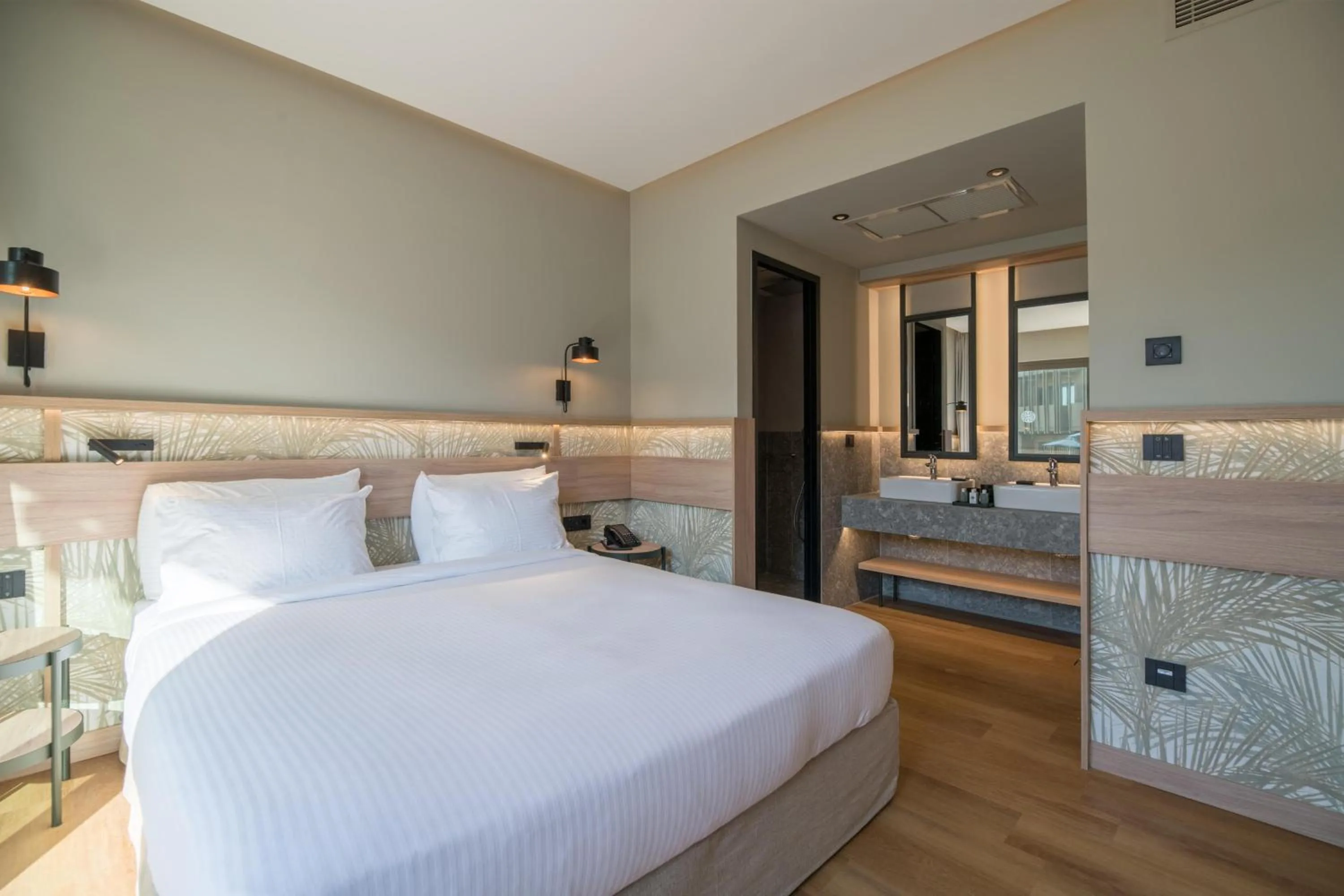 Photo of the whole room, Bed in SENSEANA Sea Side Resort & Aquadventure