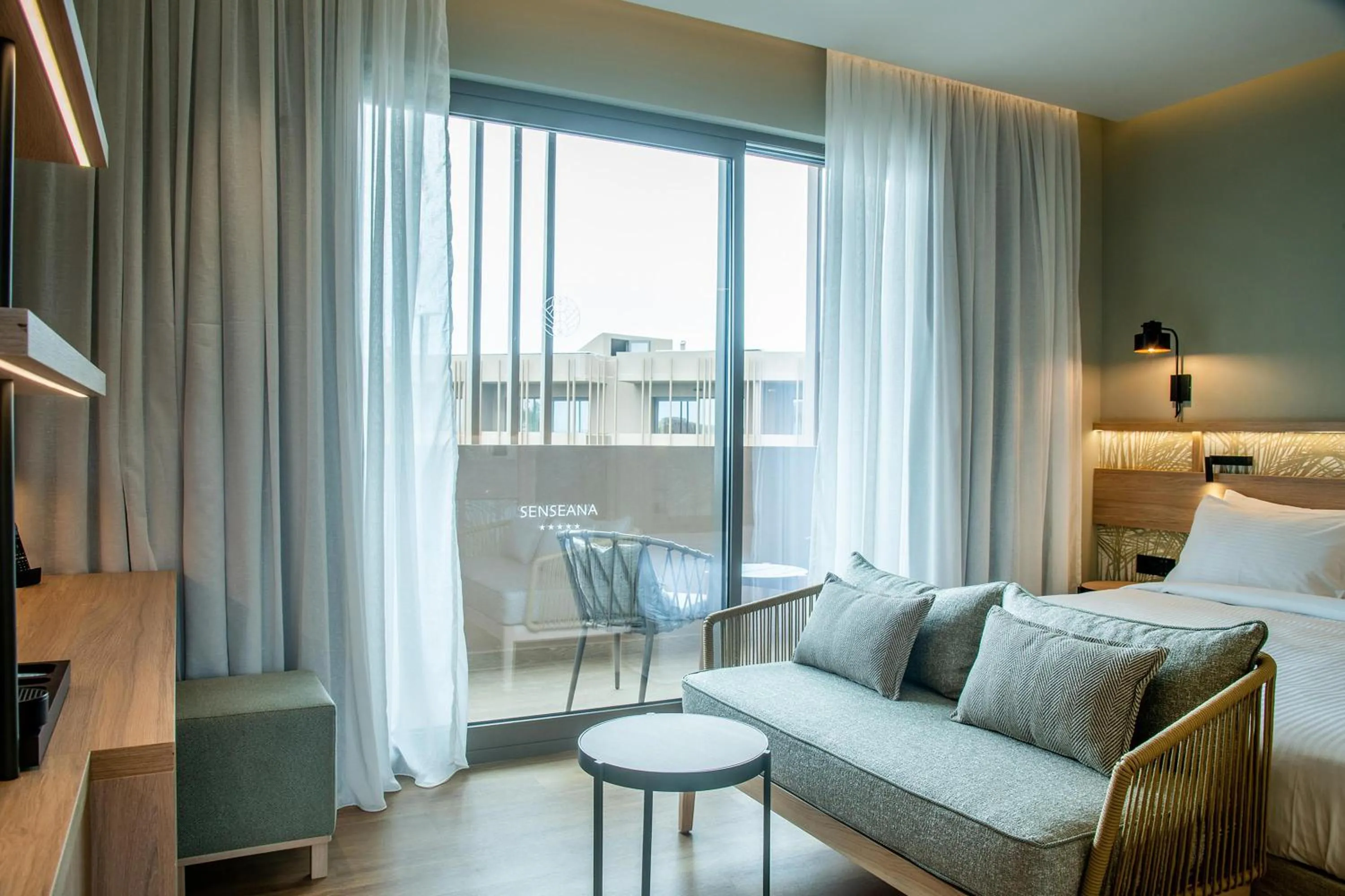 Photo of the whole room, Bed in SENSEANA Sea Side Resort & Aquadventure