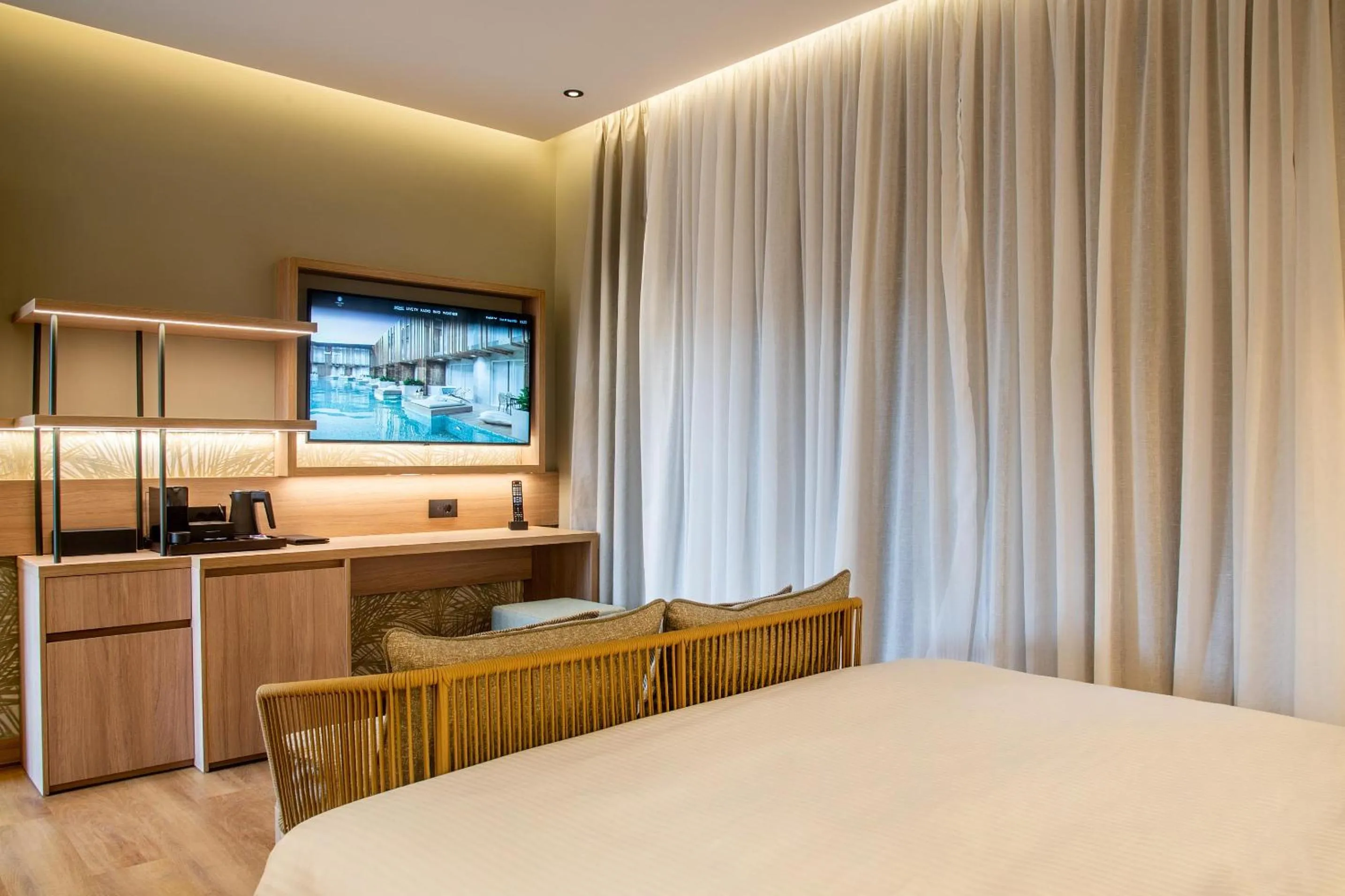 Photo of the whole room, Bed in SENSEANA Sea Side Resort & Aquadventure