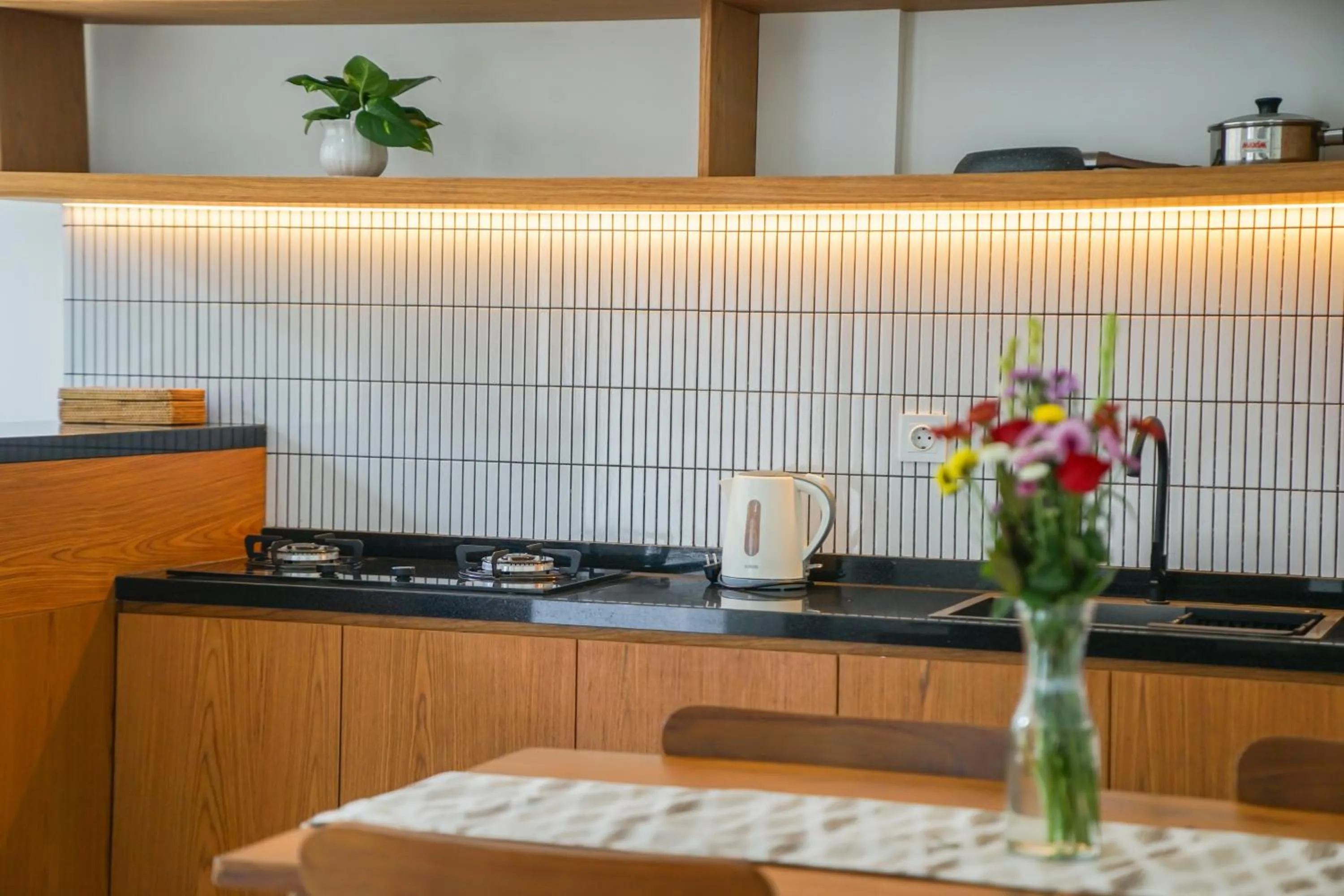 Kitchen or kitchenette in Varila Villa Ubud