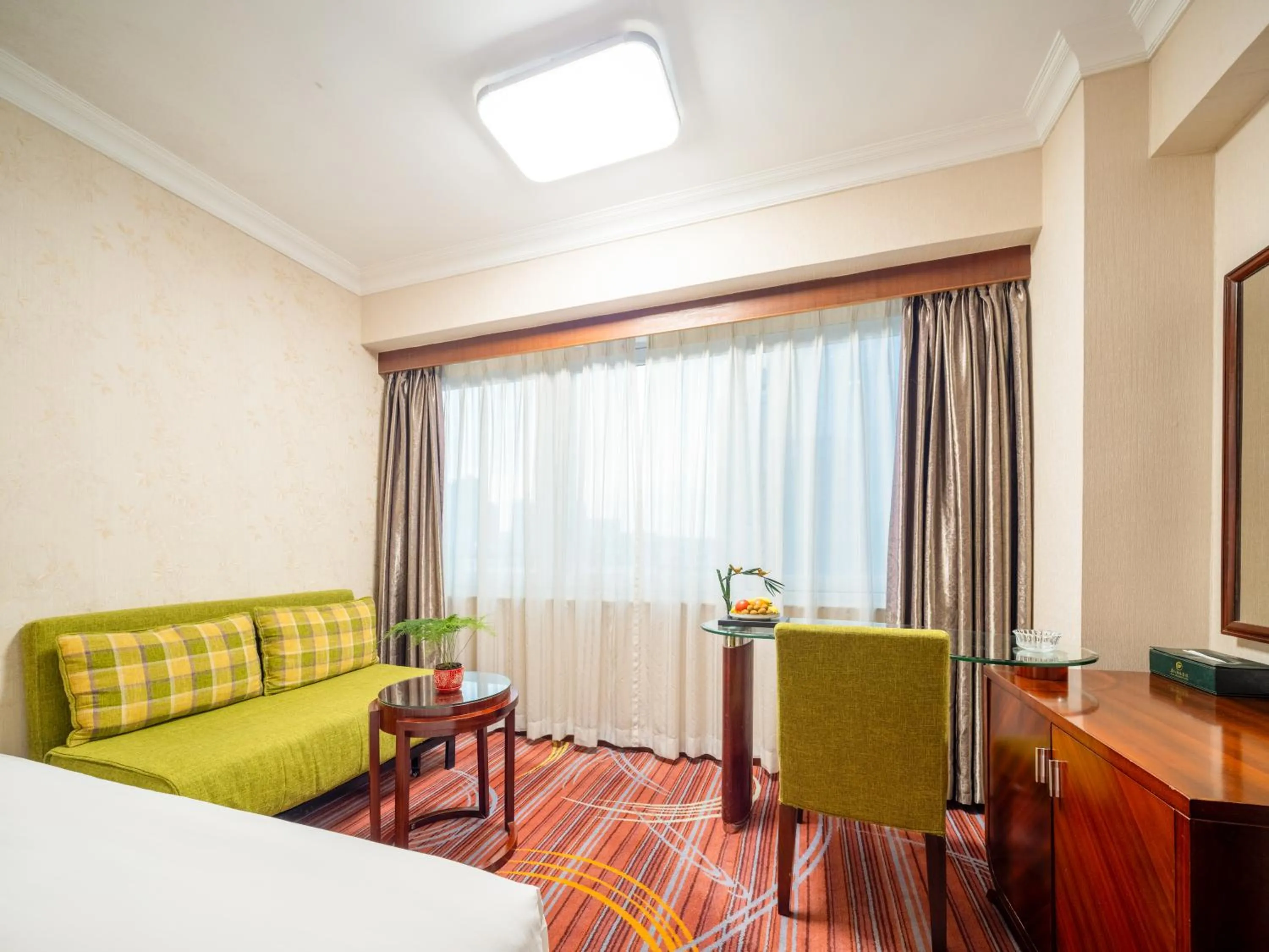Seating area, Bed in Guangzhou Hutian Hotel