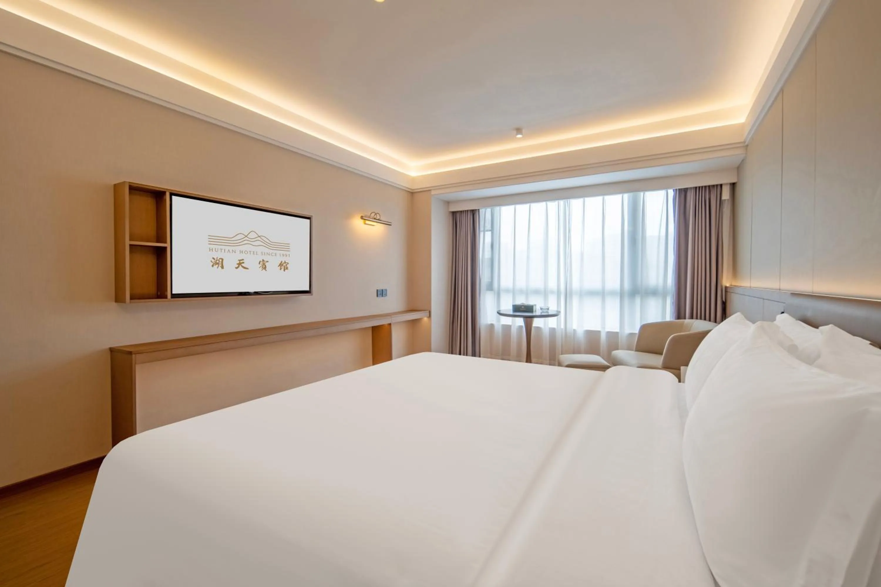 Bed in Guangzhou Hutian Hotel