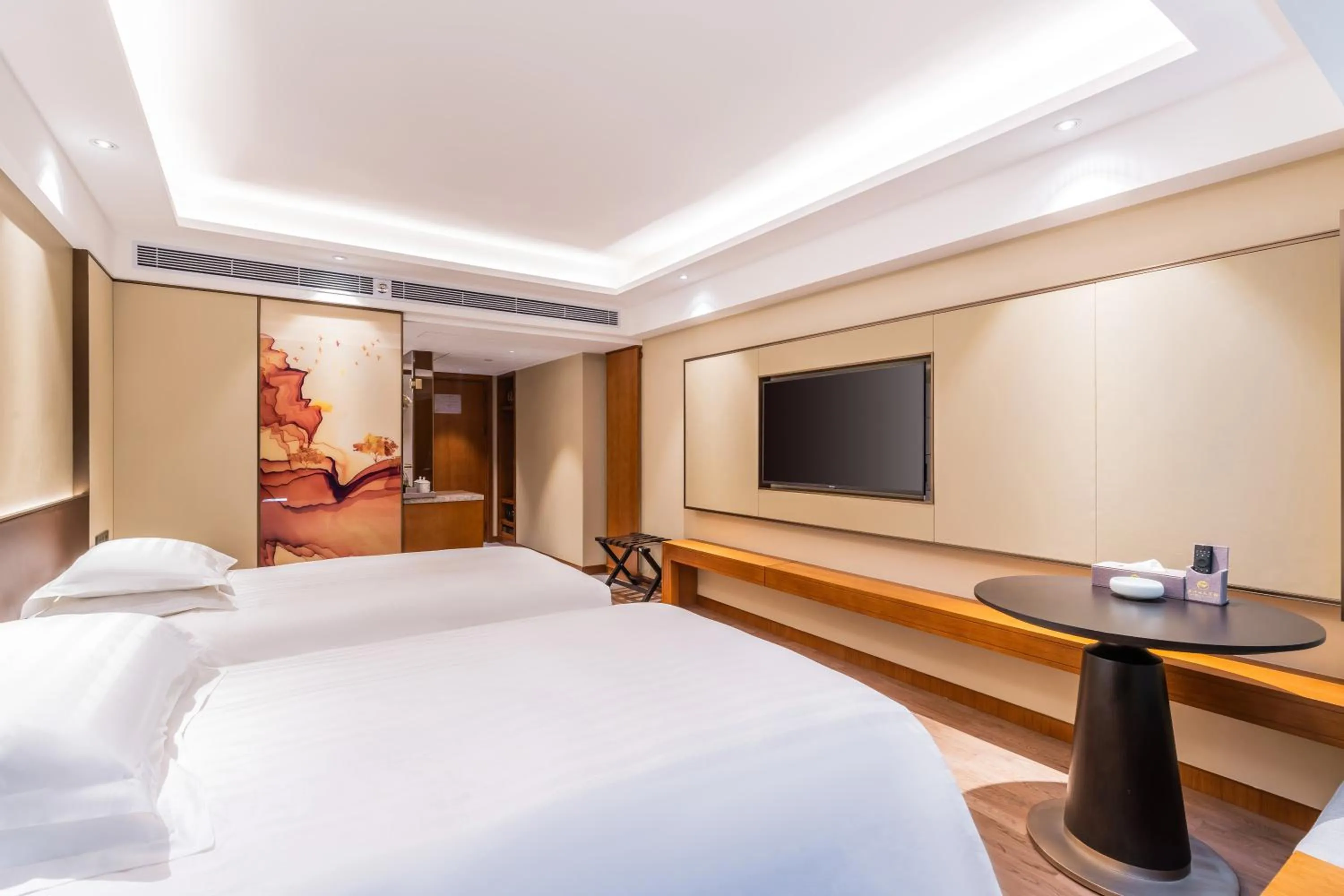 Bed in Guangzhou Hutian Hotel