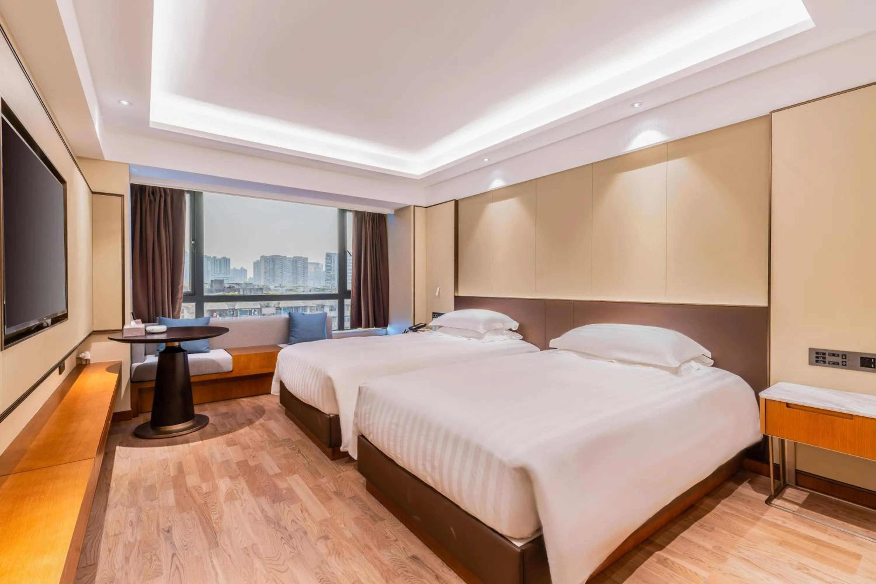 Bed in Guangzhou Hutian Hotel