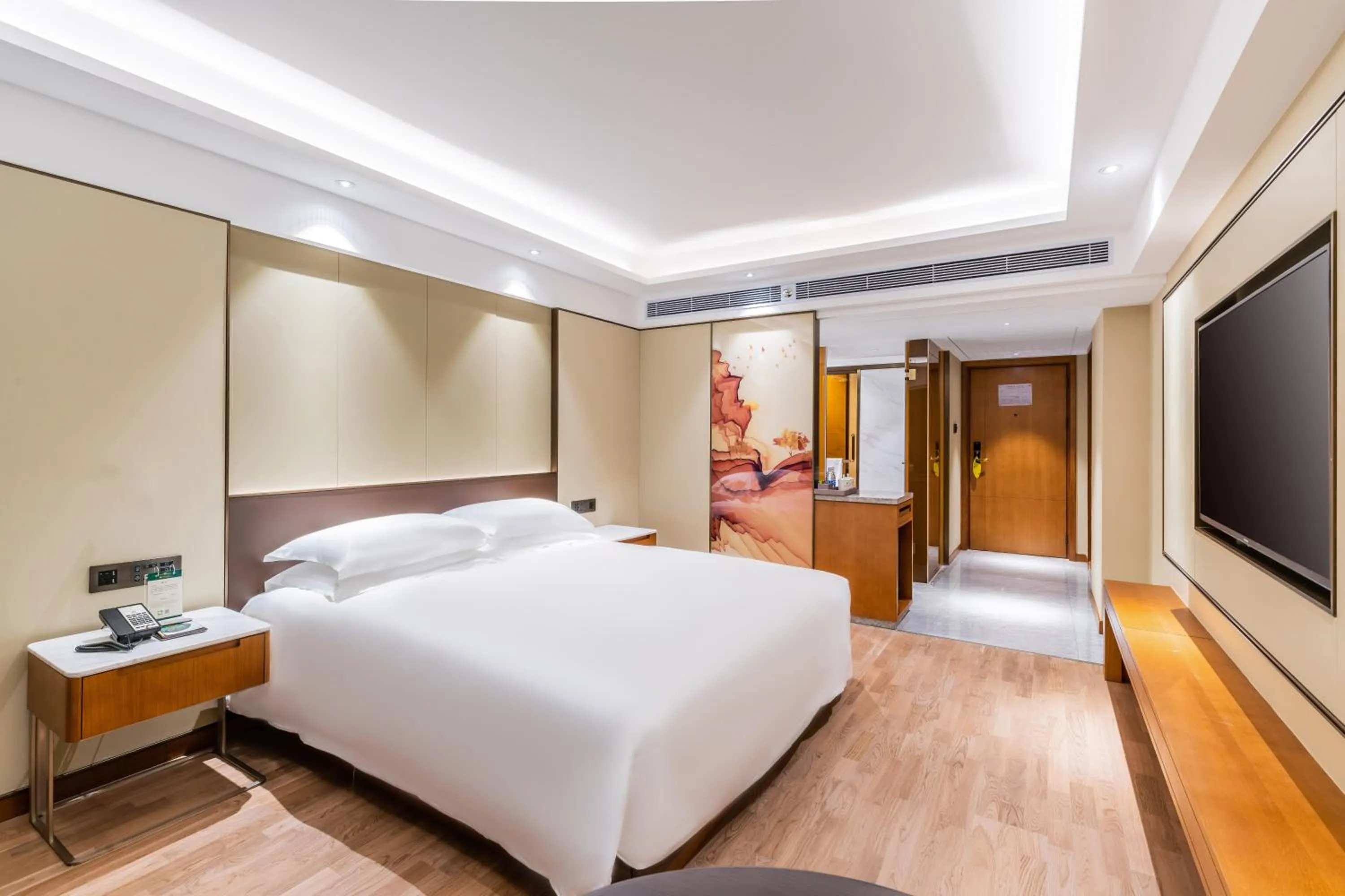 Bed in Guangzhou Hutian Hotel