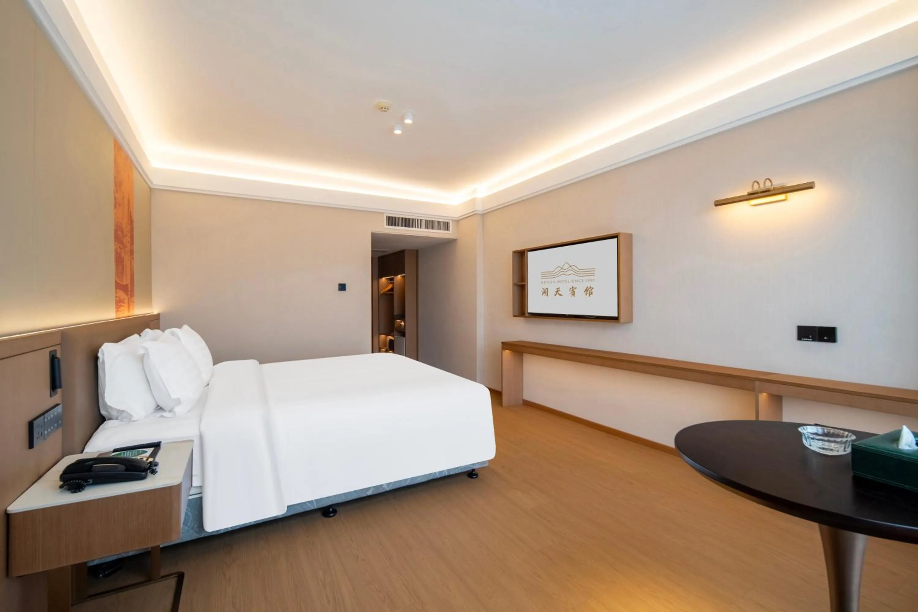 Bed in Guangzhou Hutian Hotel