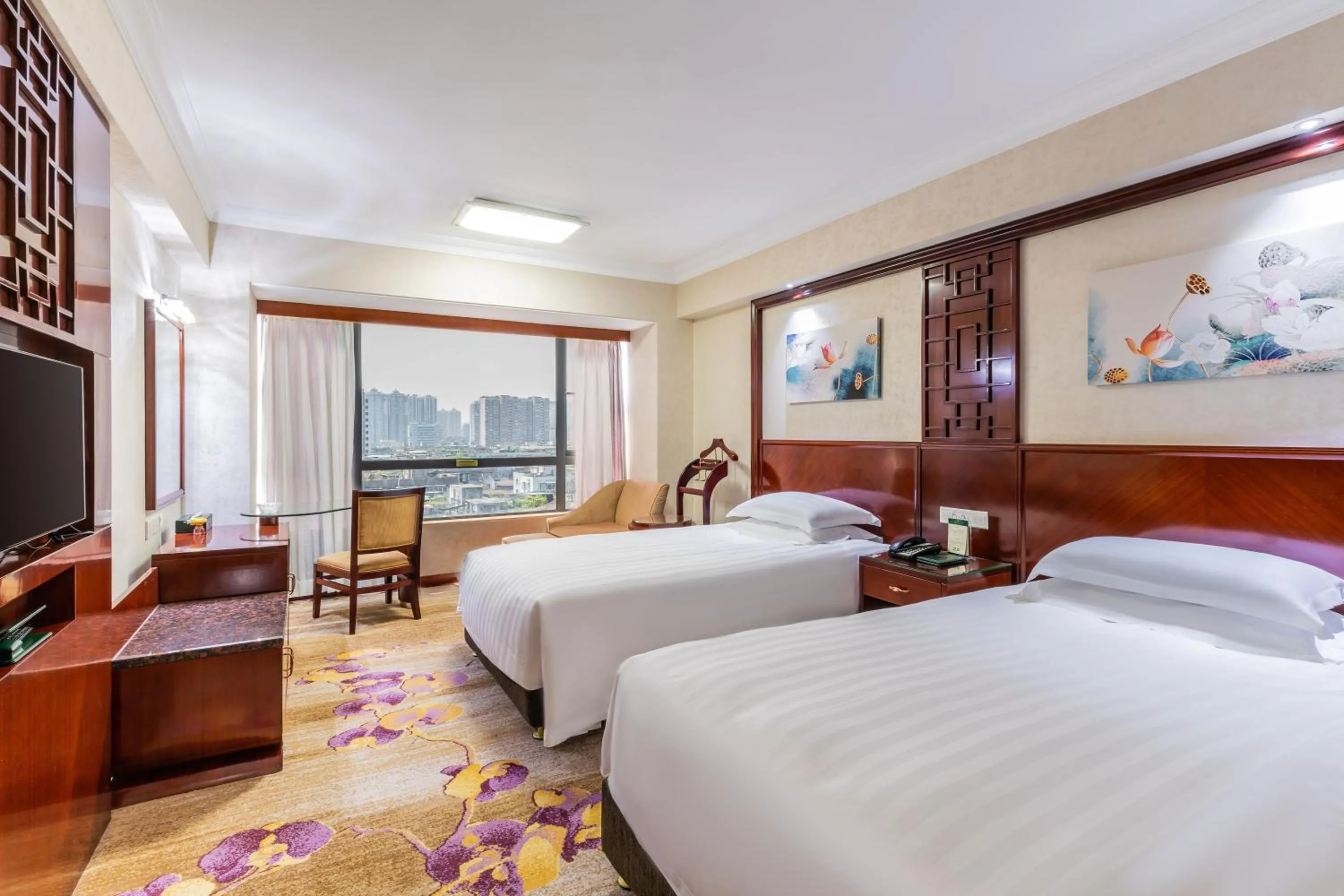 Bed in Guangzhou Hutian Hotel