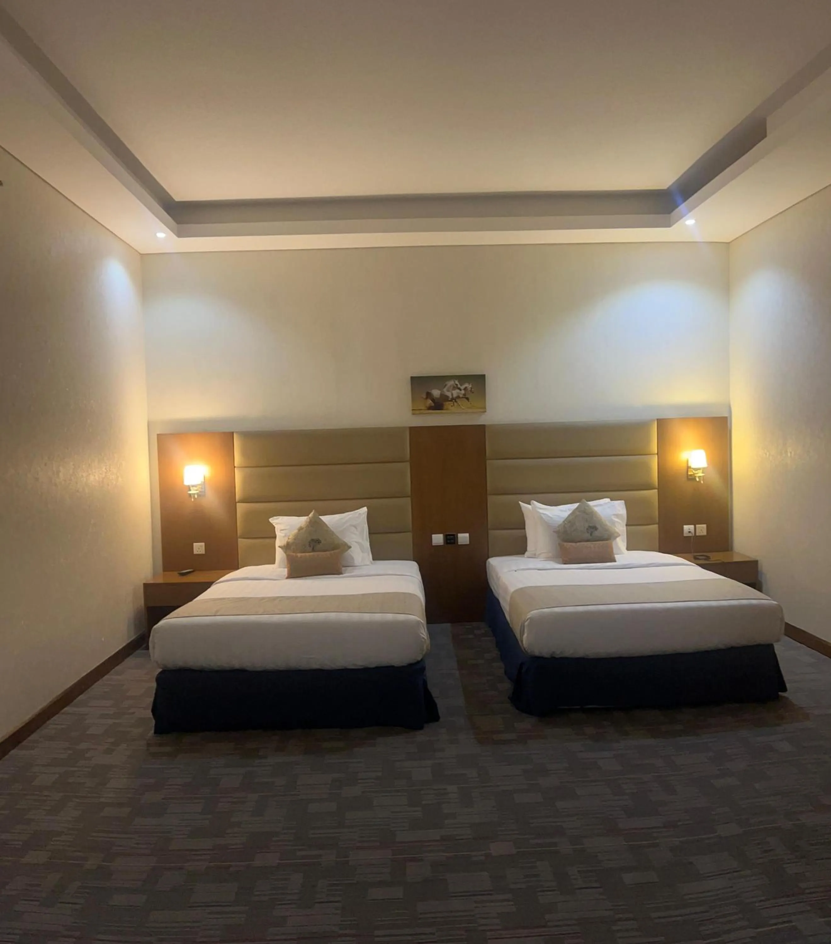 Bed in Tamr Inn Hotel