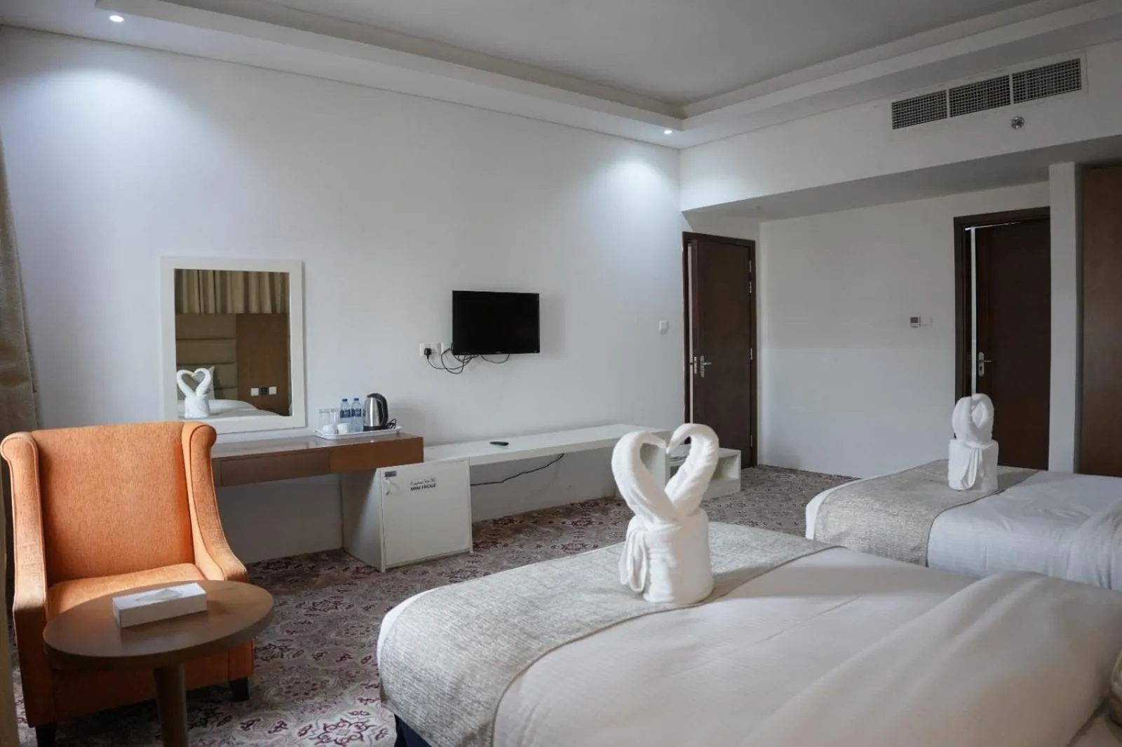 Bed in Tamr Inn Hotel